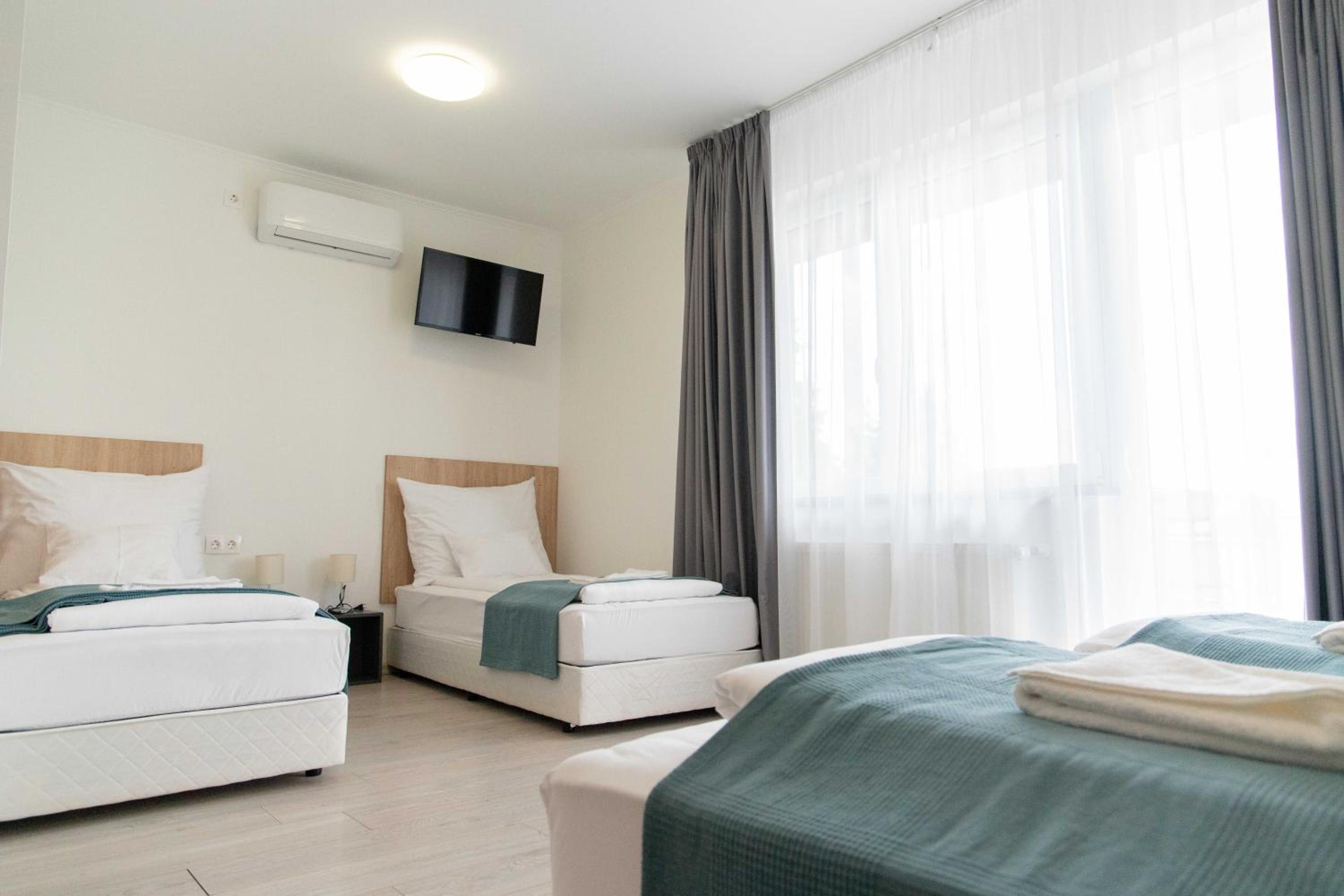 Quadruple Room with Balcony photo 2