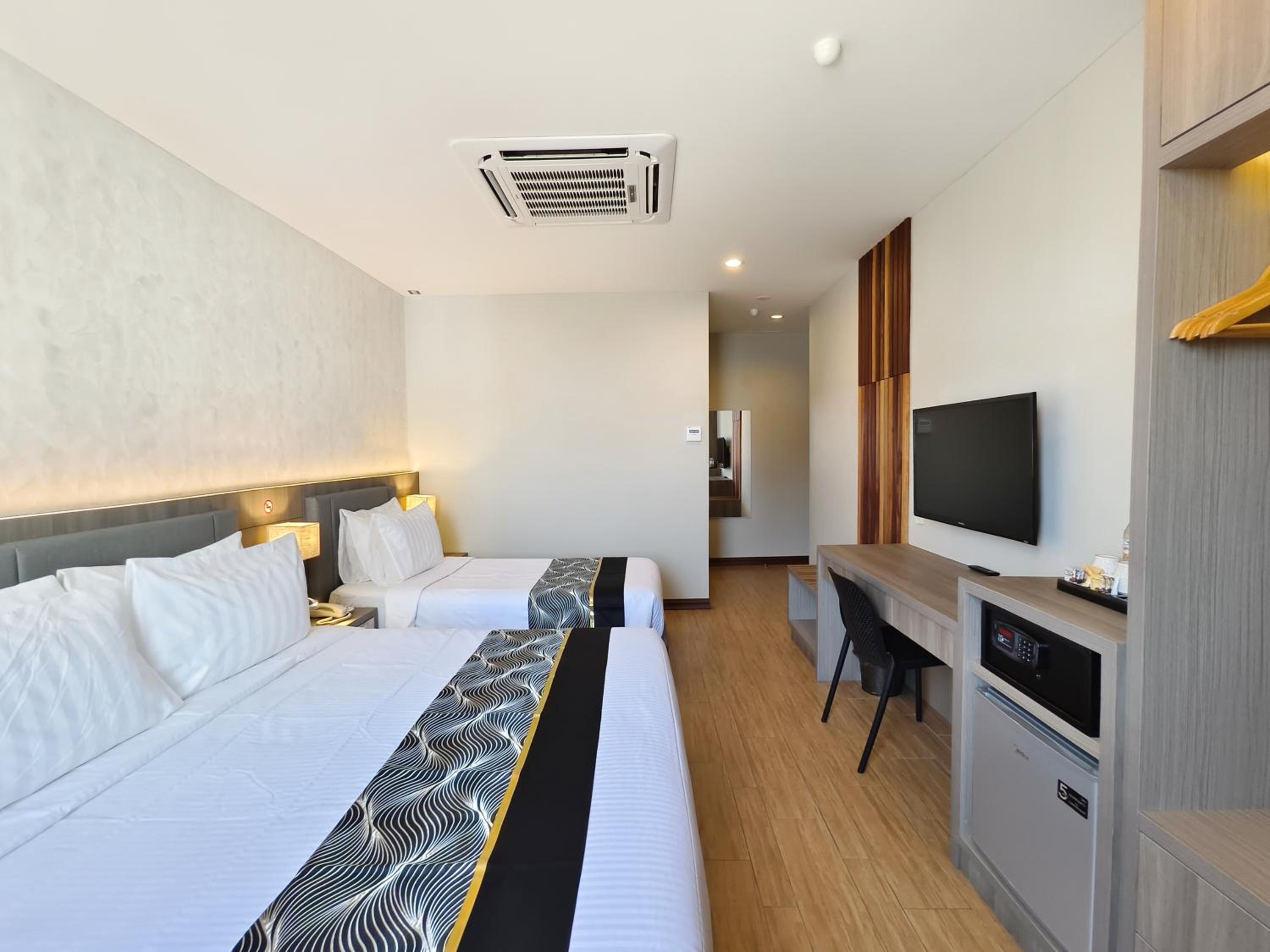 Deluxe Triple Room - Photo 2