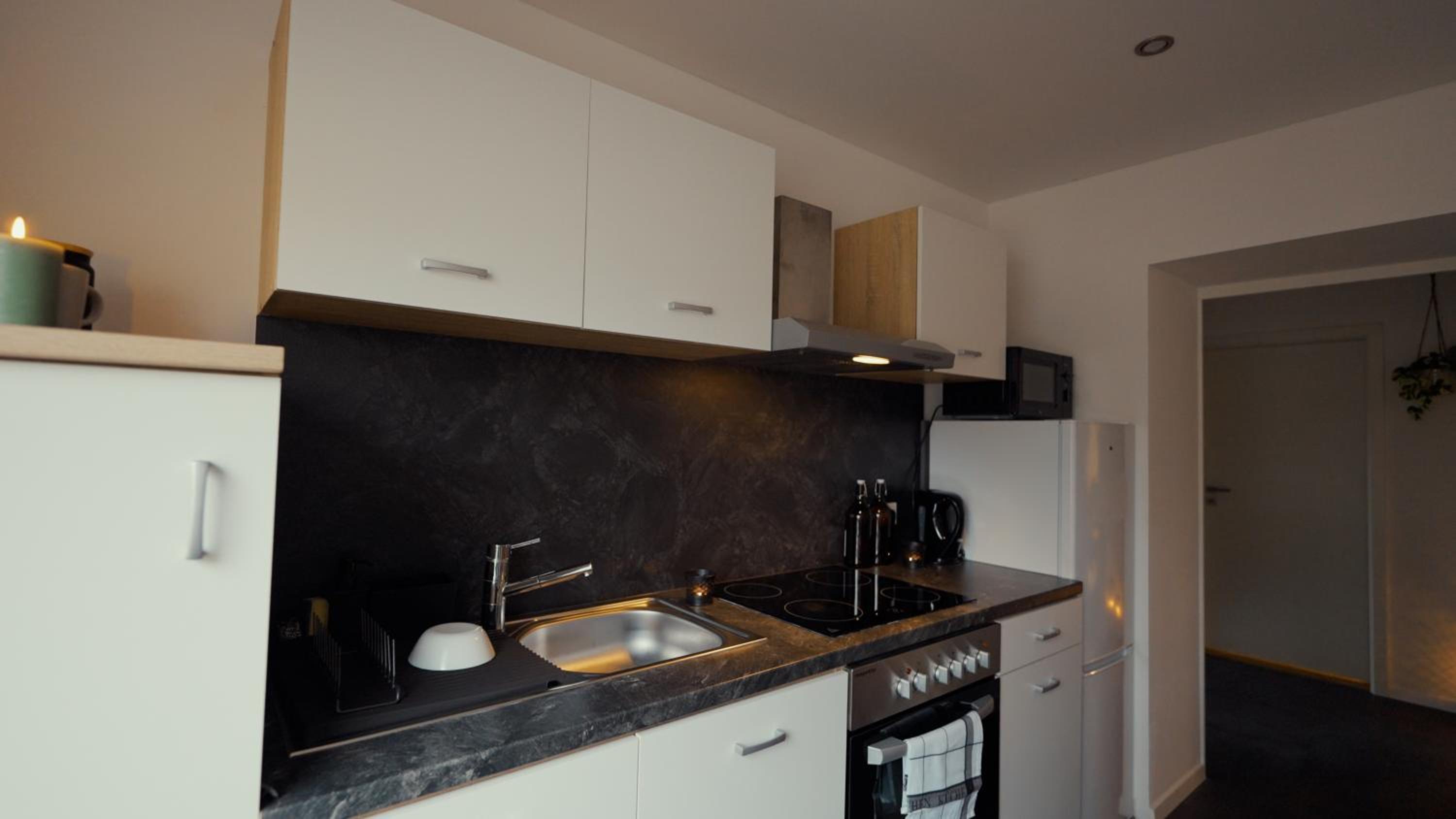 Three-Bedroom Apartment photo 2
