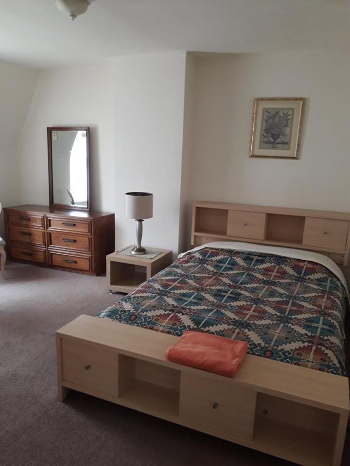 Queen Room with Shared Bathroom