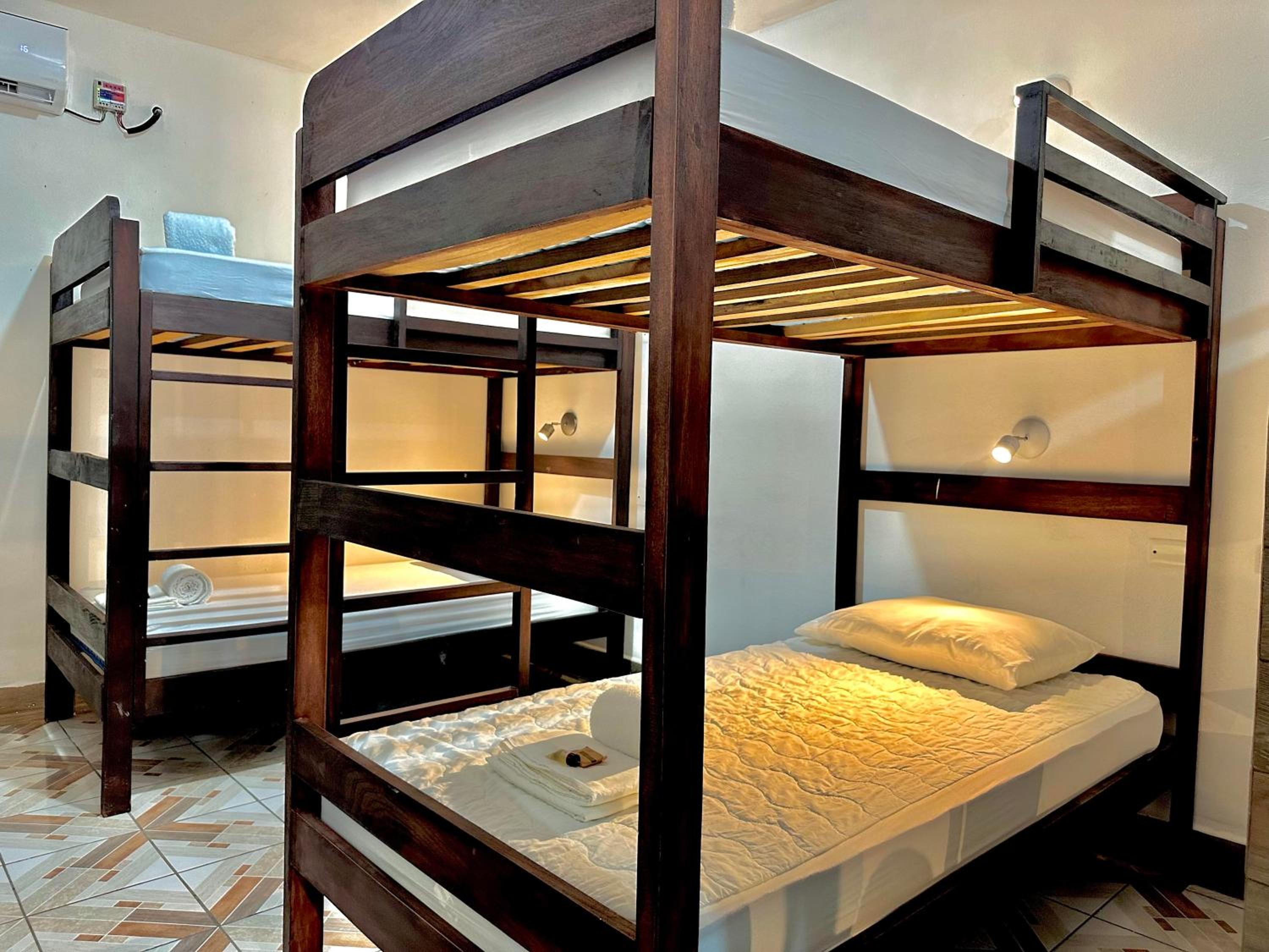 Single Bed in Dormitory Room
