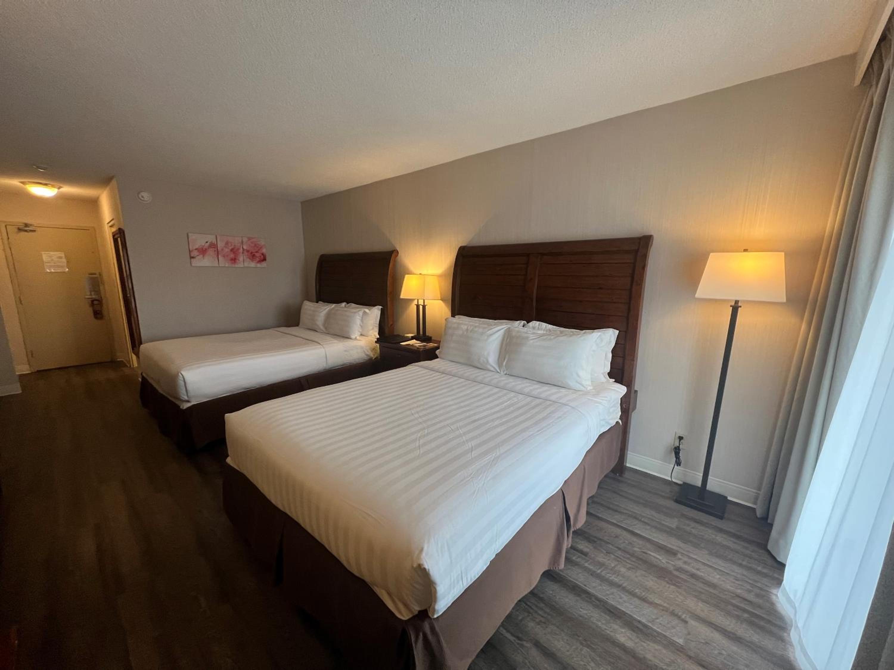 Queen Room with Two Queen Beds and Balcony - Non-Smoking - Photo 1