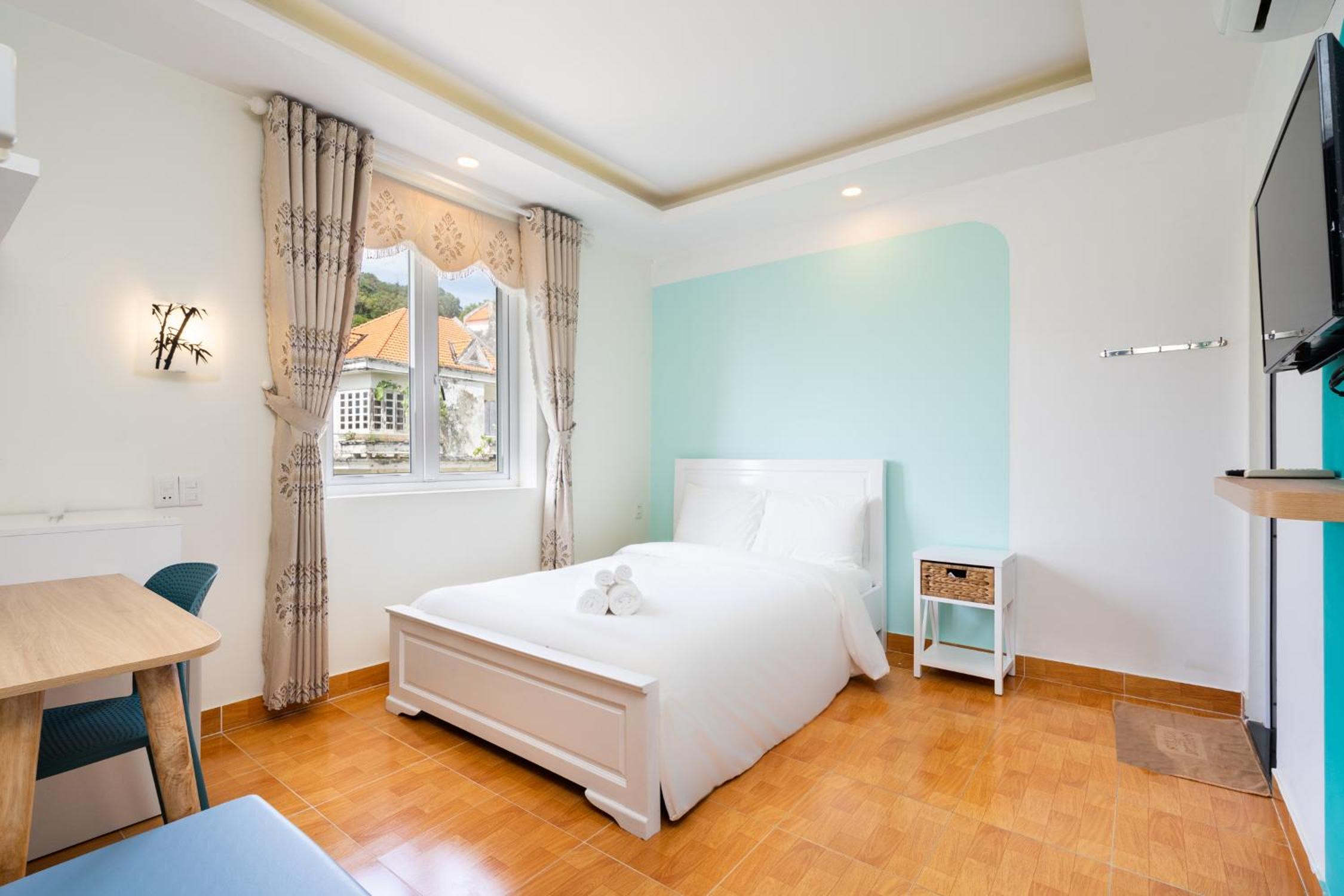 Deluxe Room - Photo 10