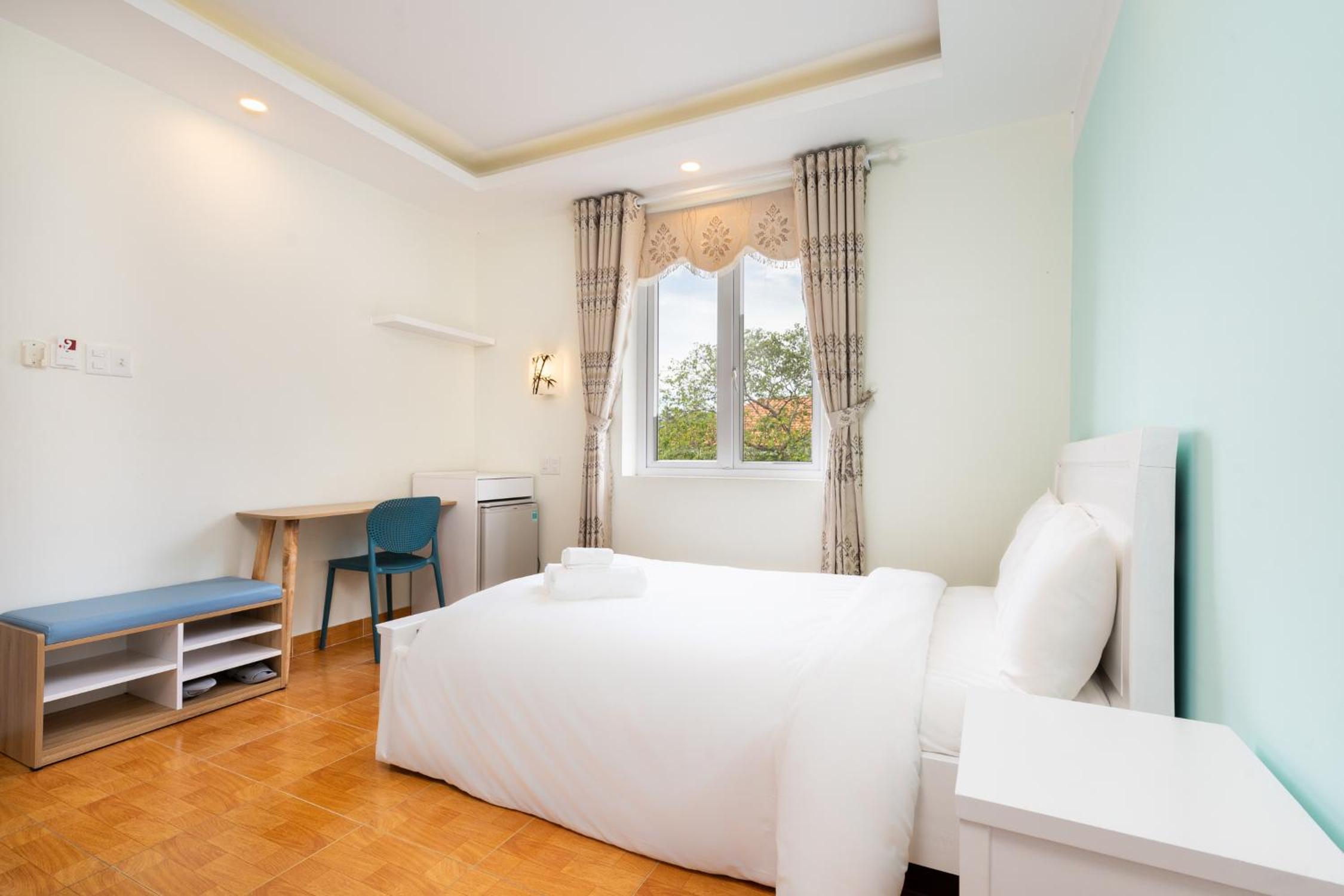 Deluxe Room - Photo 12
