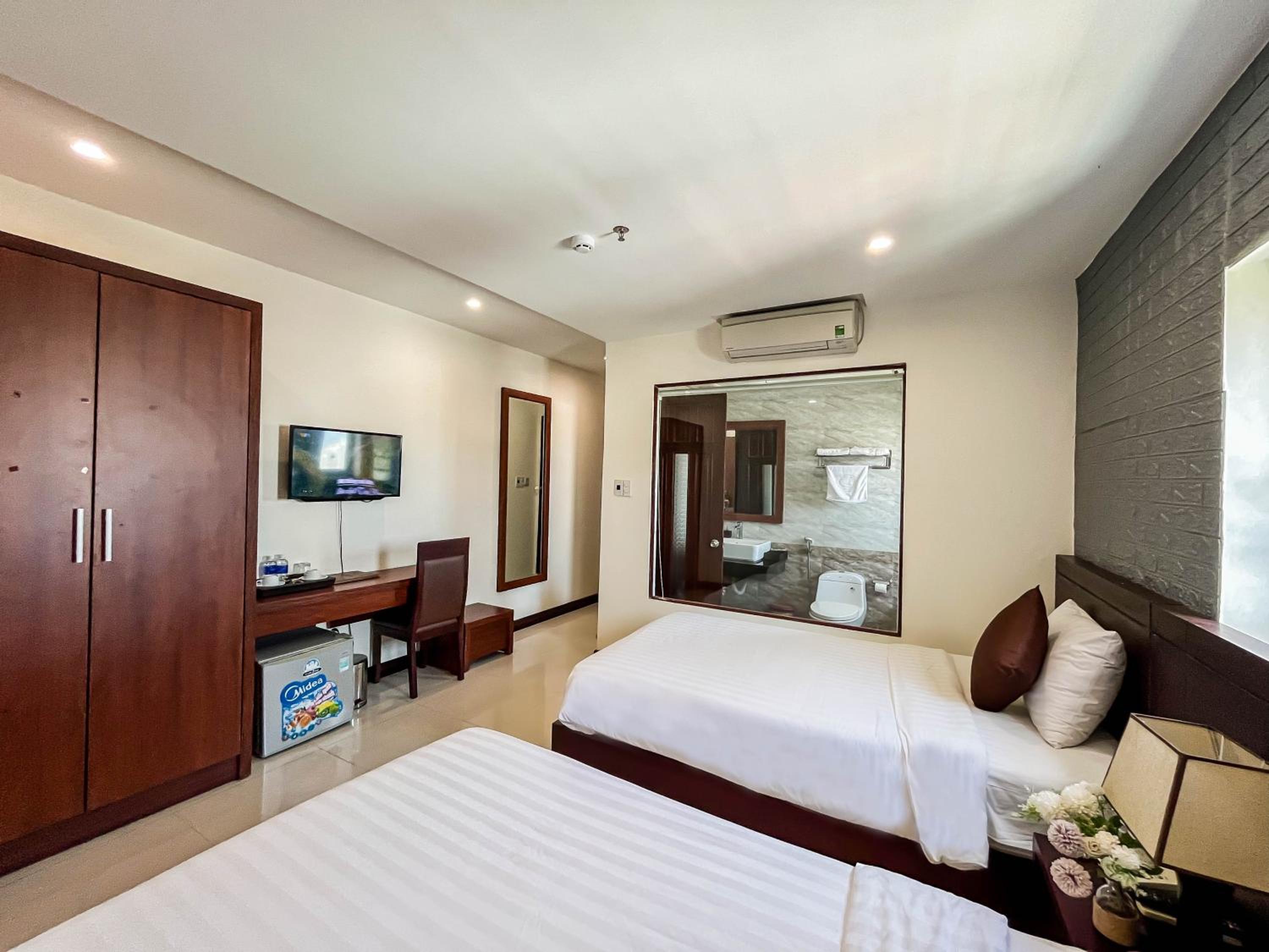 Deluxe Twin Room - Photo 2