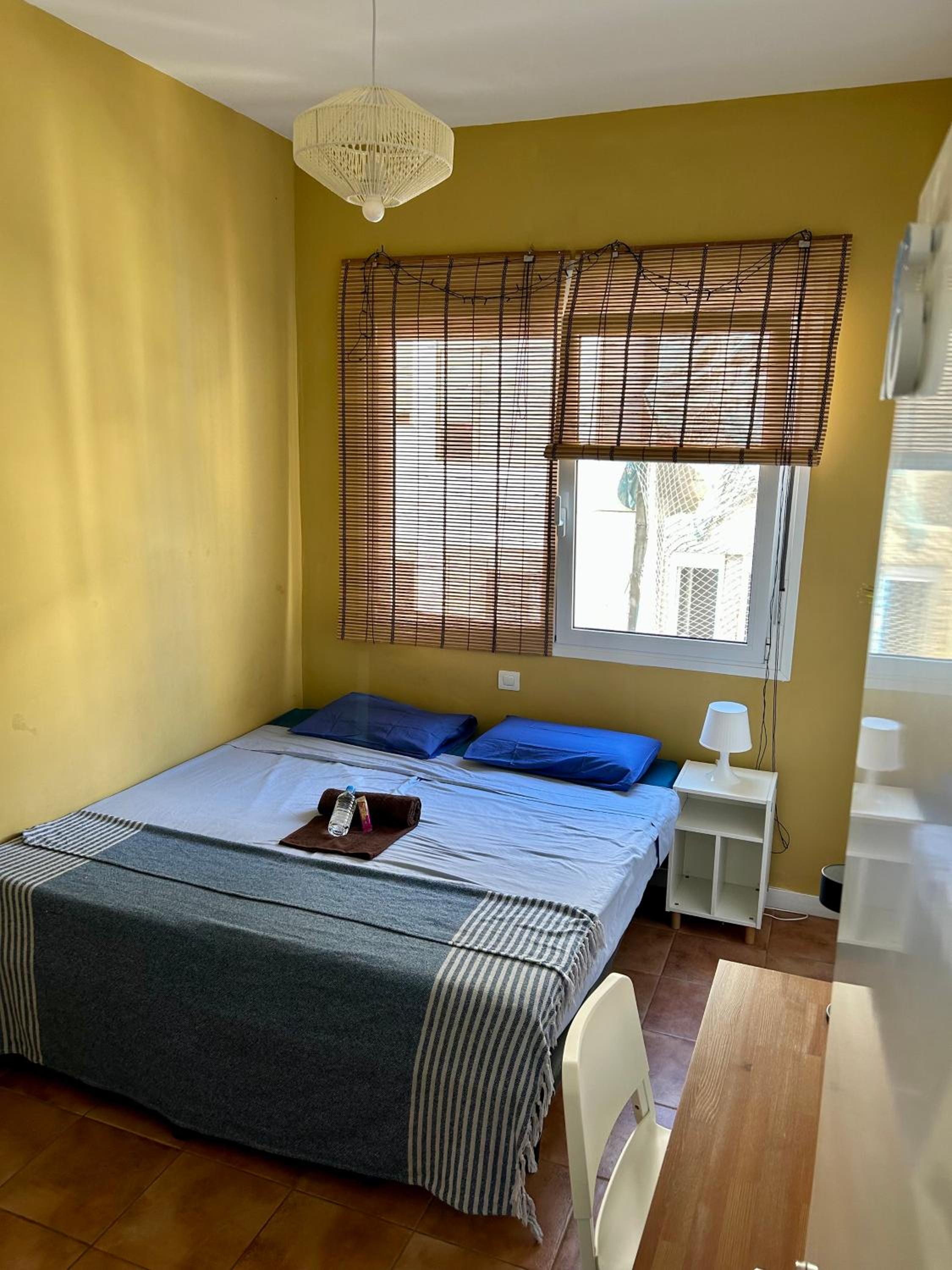 Habitación doble con baño compartido