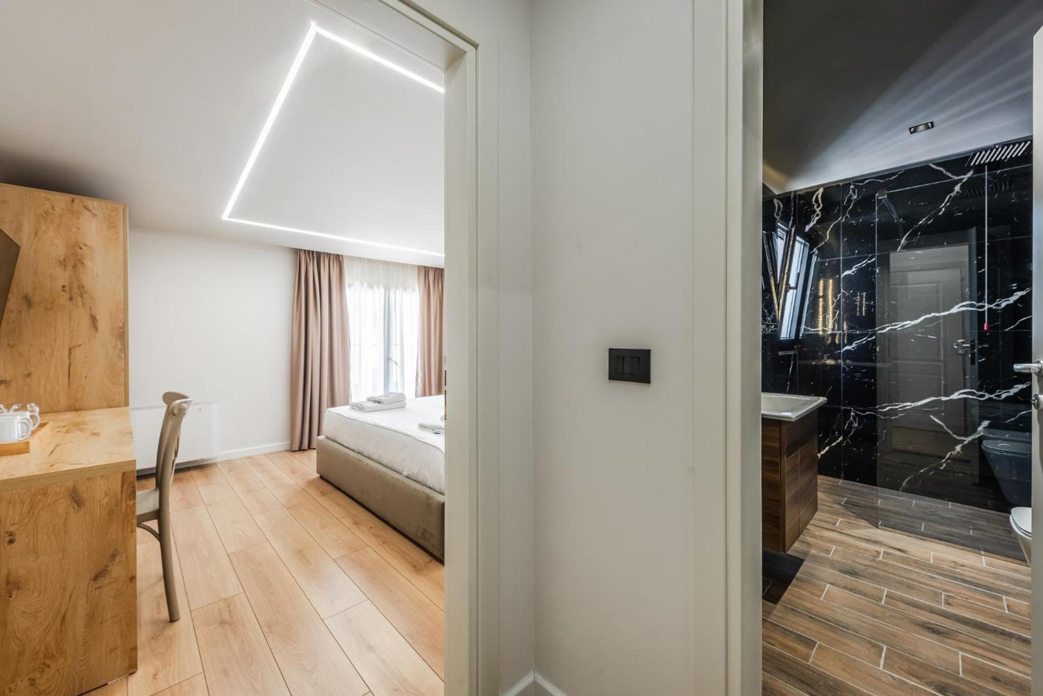 Deluxe Double Room with Side Sea View