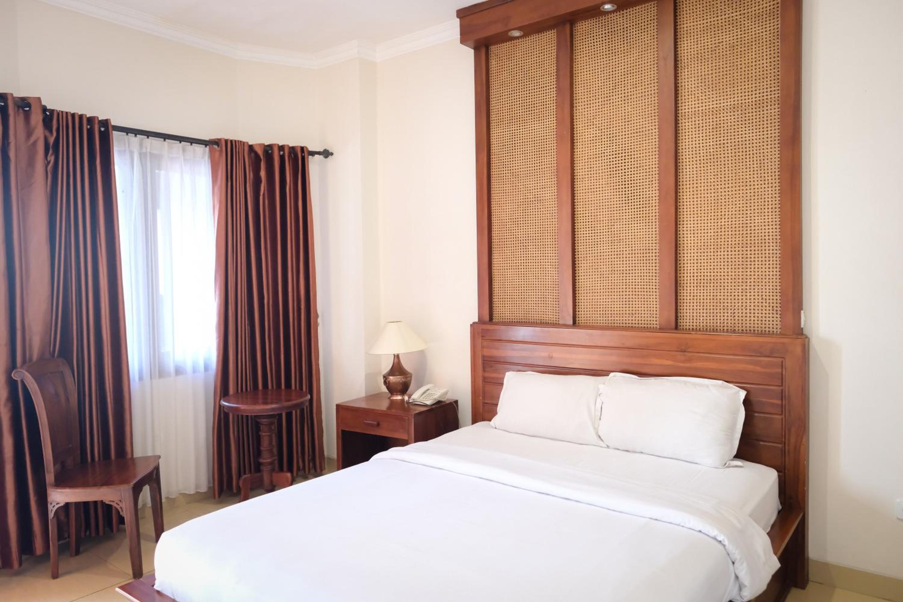 Deluxe Room - Photo 1
