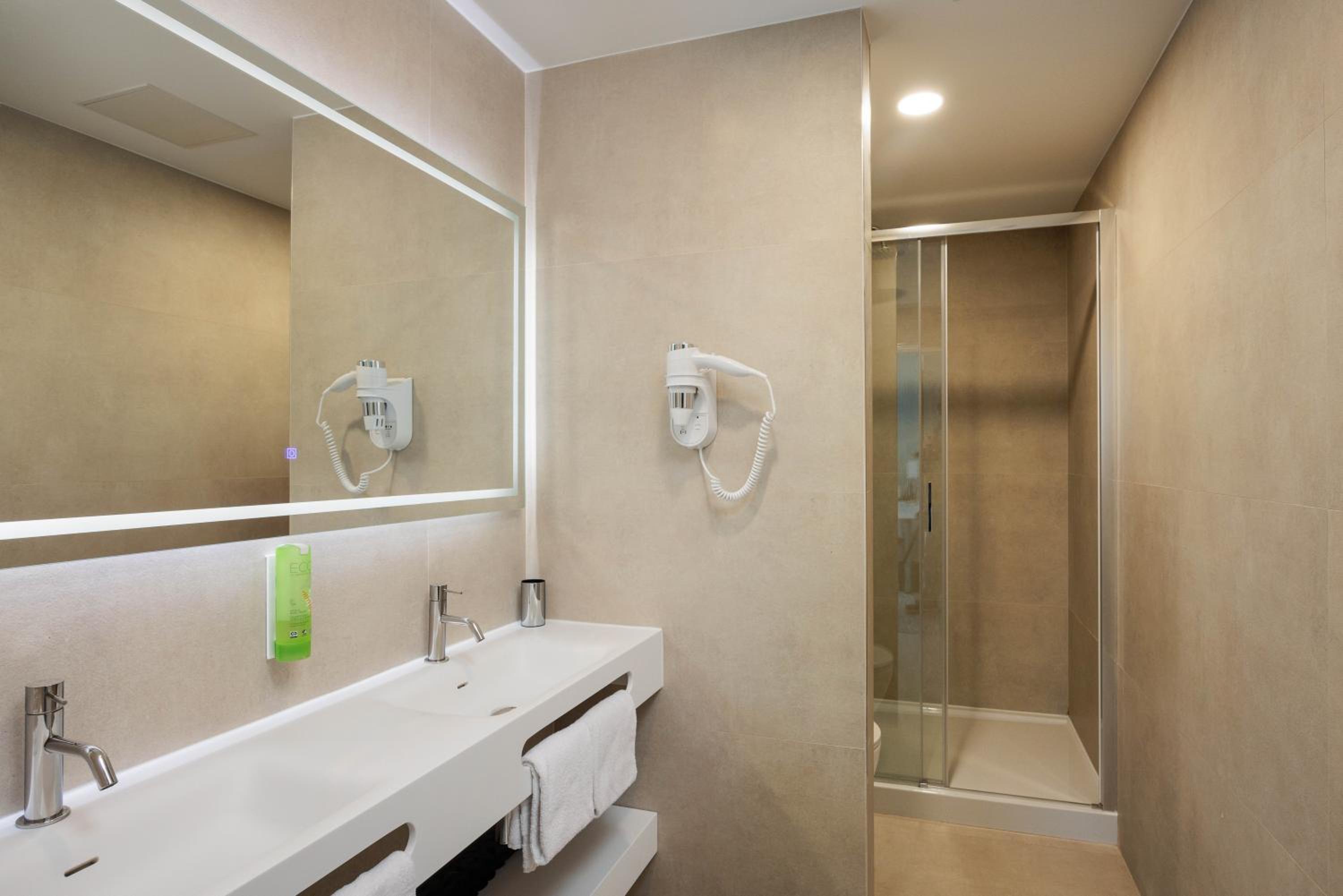 Relax in our modern and stylish bathroom retreat.