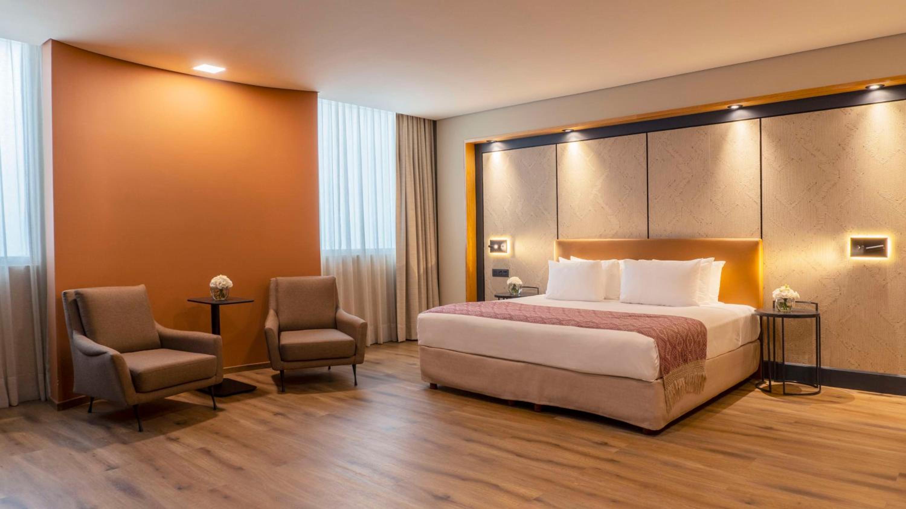 Premium Double or Two Queen Room - Photo 1