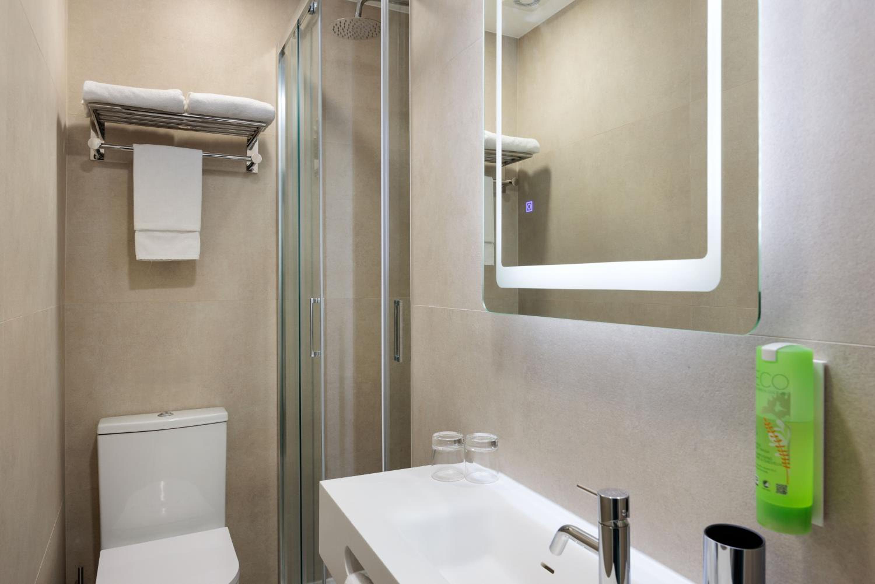 Refresh in a sleek and modern bathroom oasis!