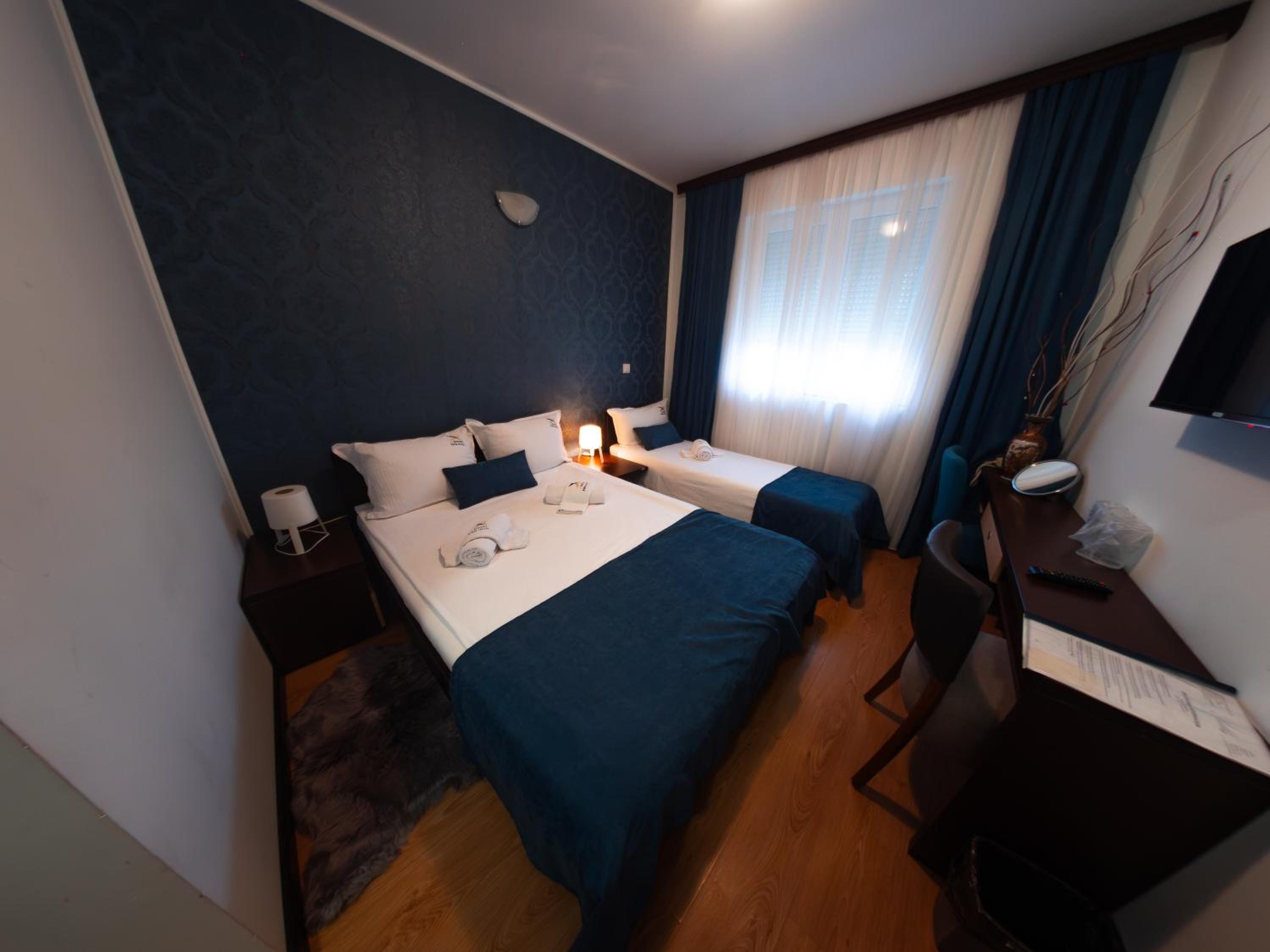Triple Room - Photo 1