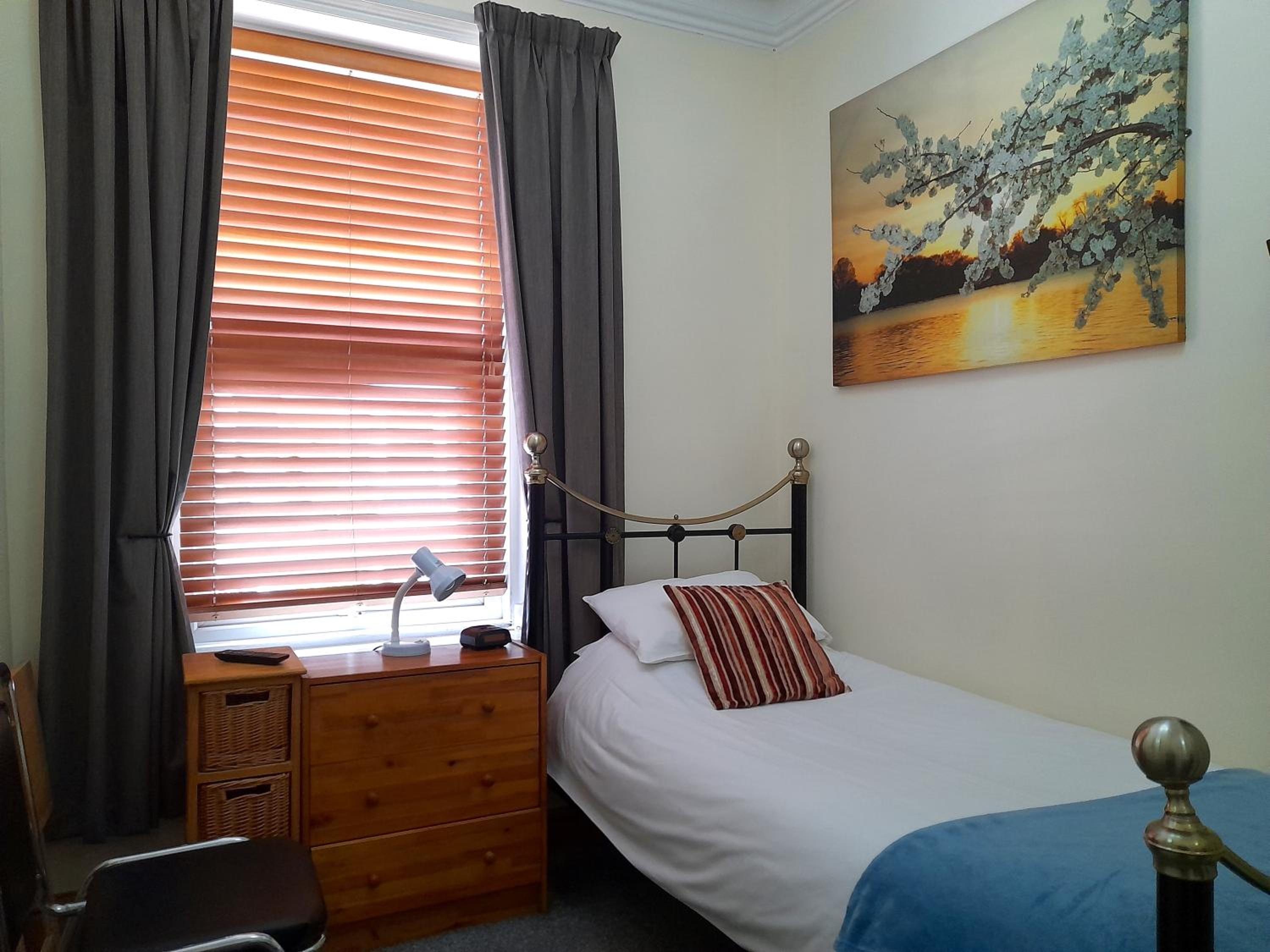 Single Room with Shared Toilet