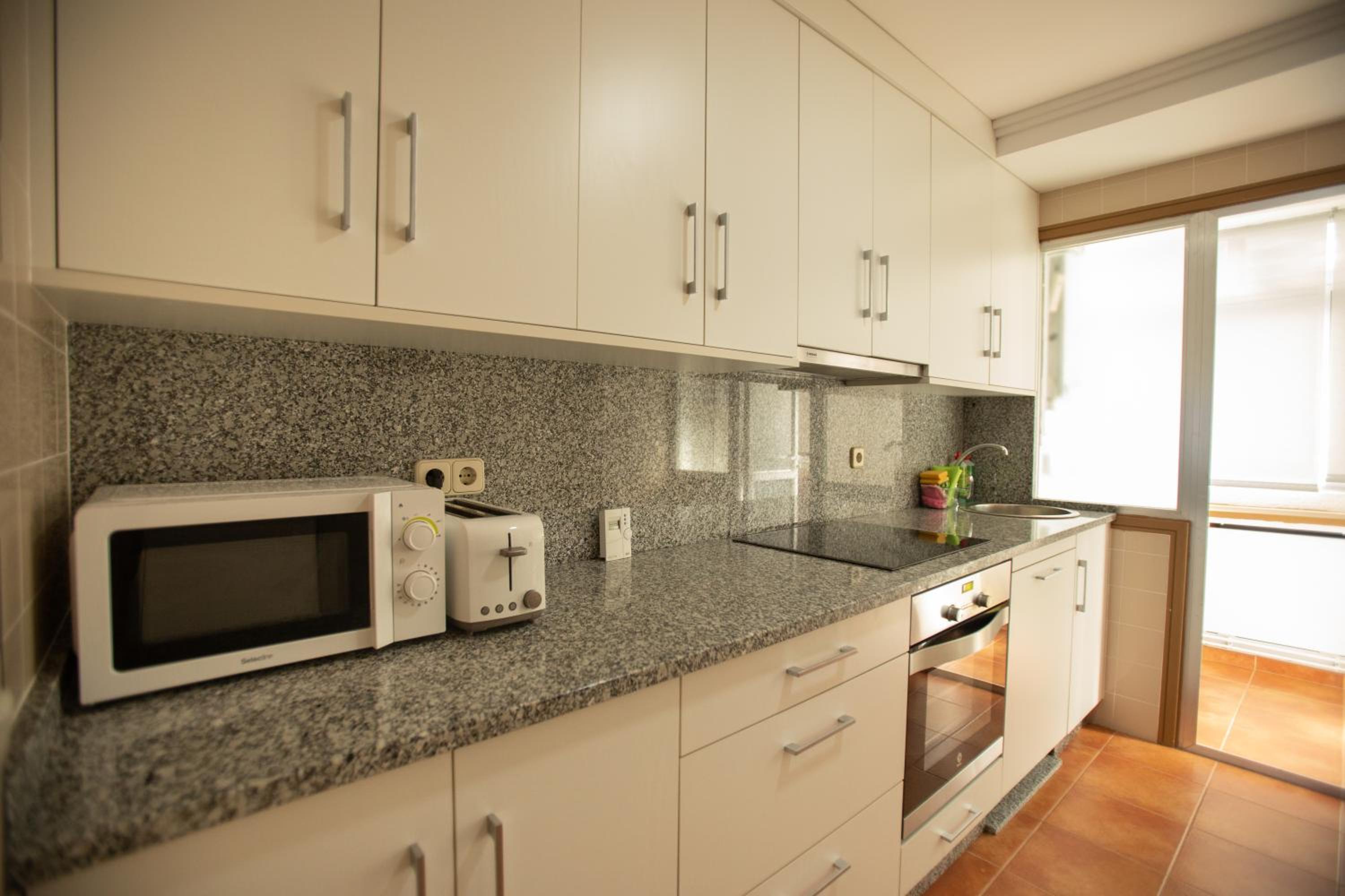 Three-Bedroom Apartment photo 2