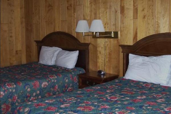 Queen Room with Two Queen Beds - Photo 1