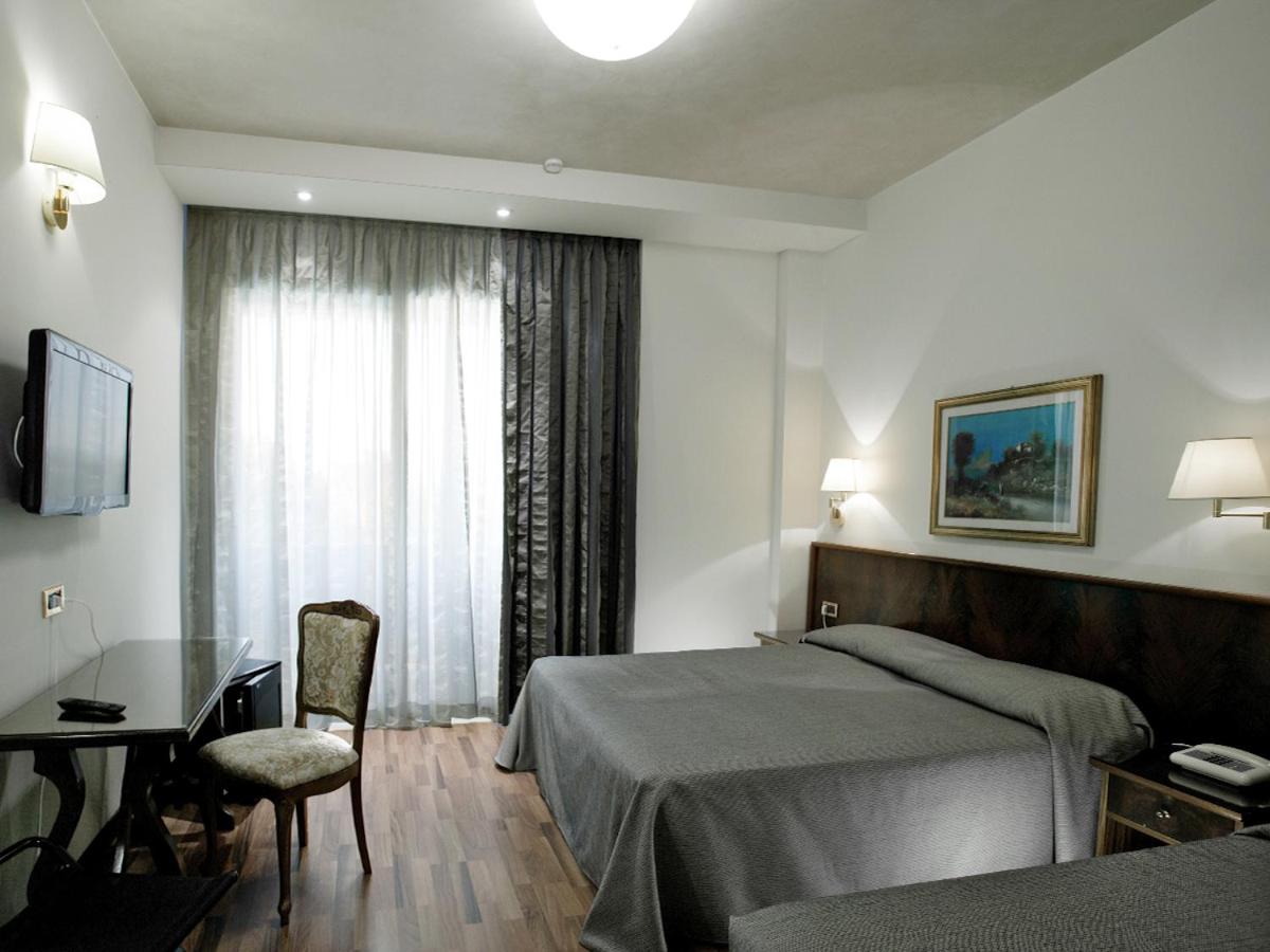 Quadruple Room with Balcony photo 2