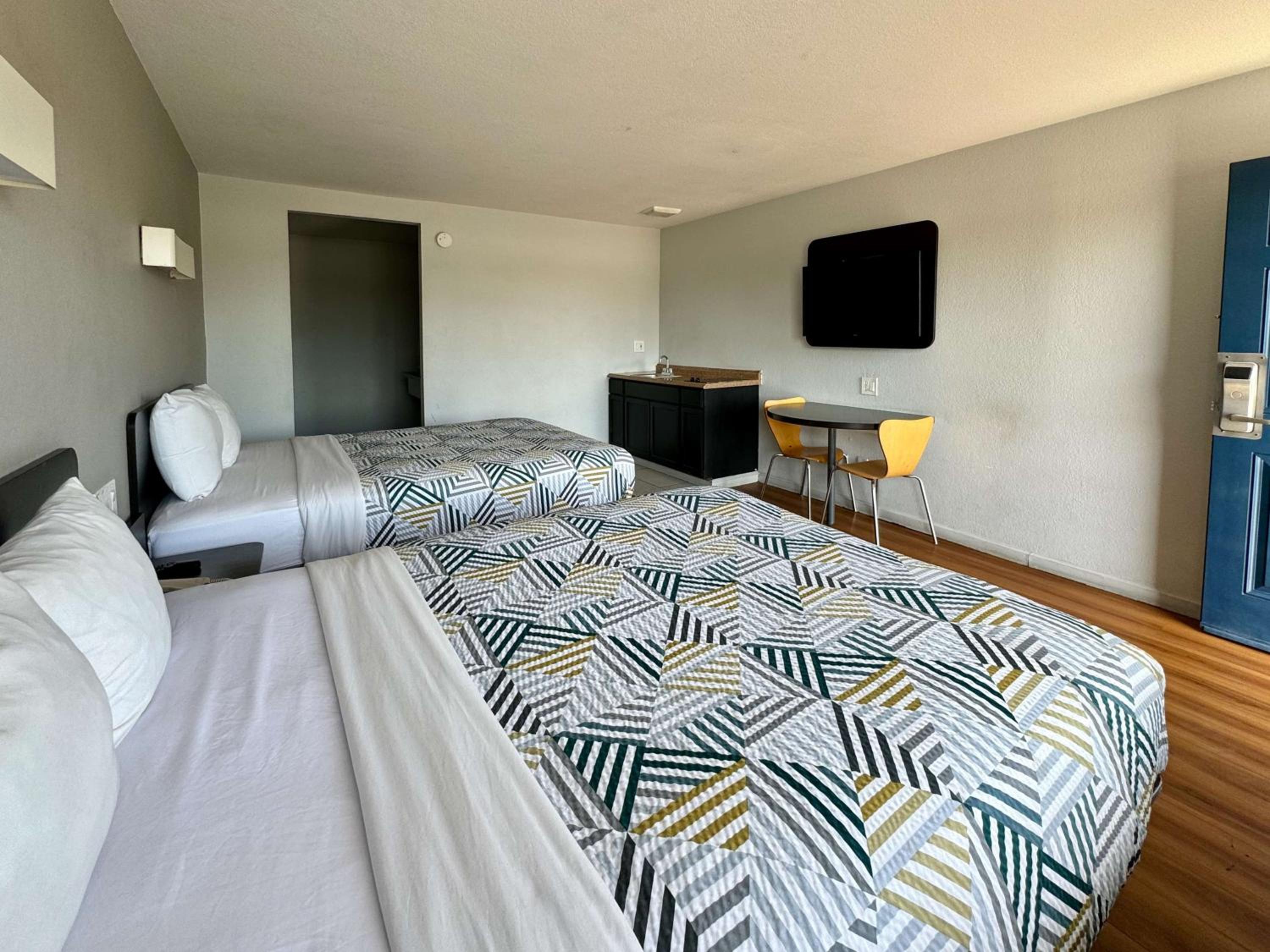 Deluxe Queen Room with Two Queen Beds - Photo 1