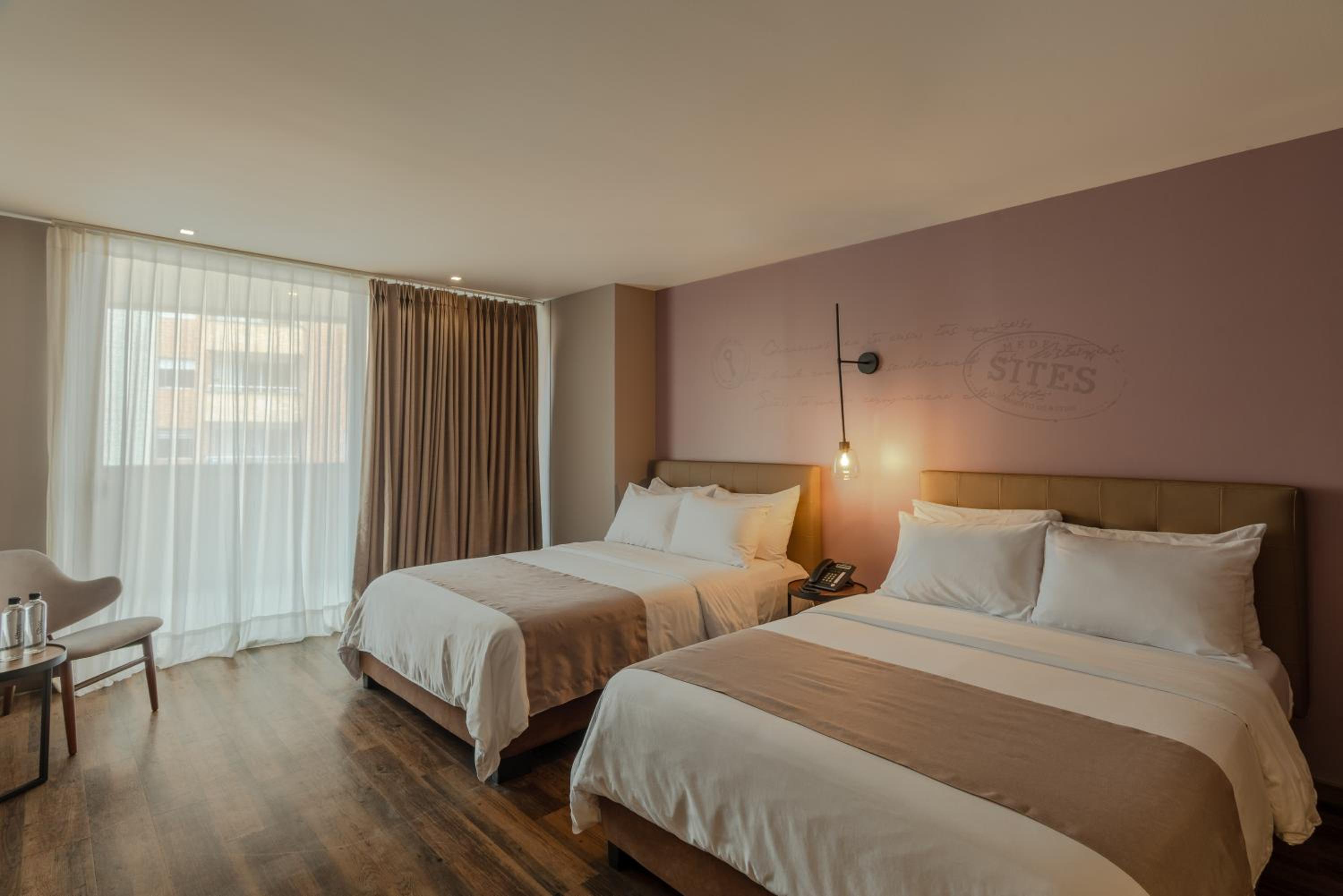 Deluxe Queen Room with Two Queen Beds photo 2