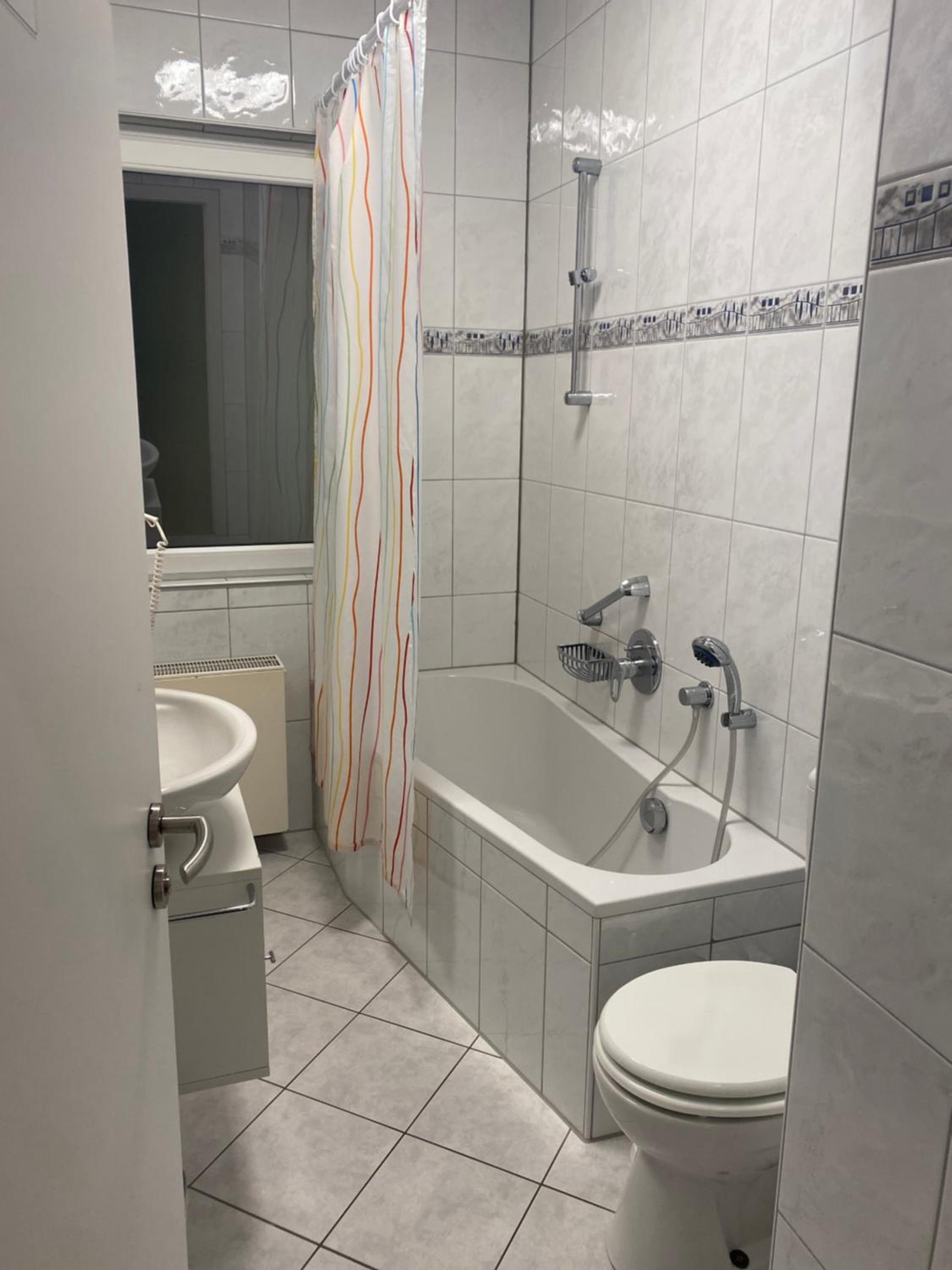 Three-Bedroom Apartment with Balcony photo 2