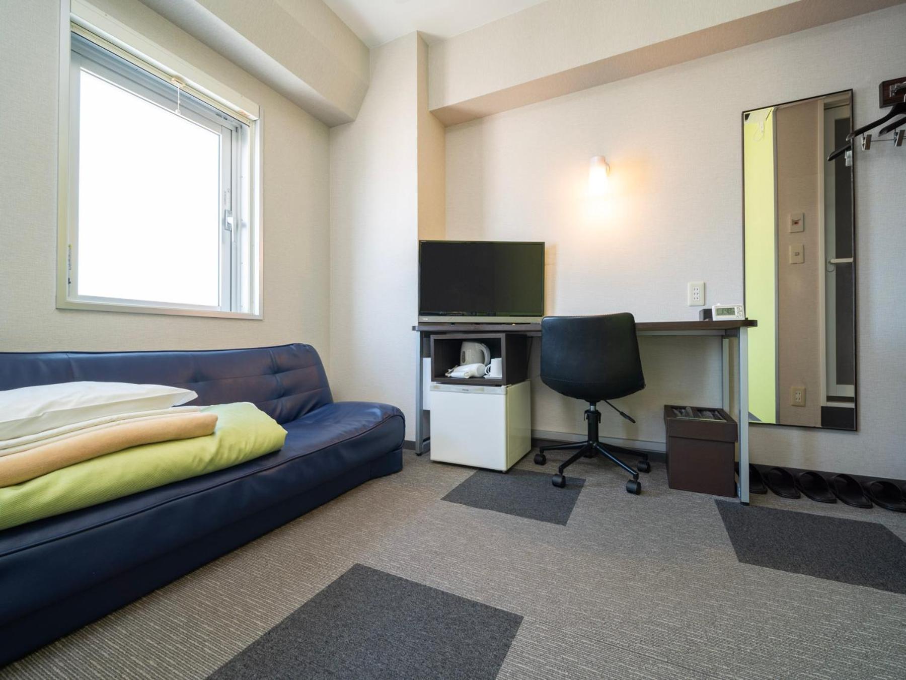 Quadruple Room - Non-Smoking - Photo 15