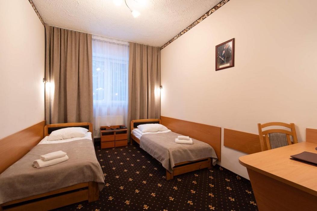 Twin Room - Photo 1