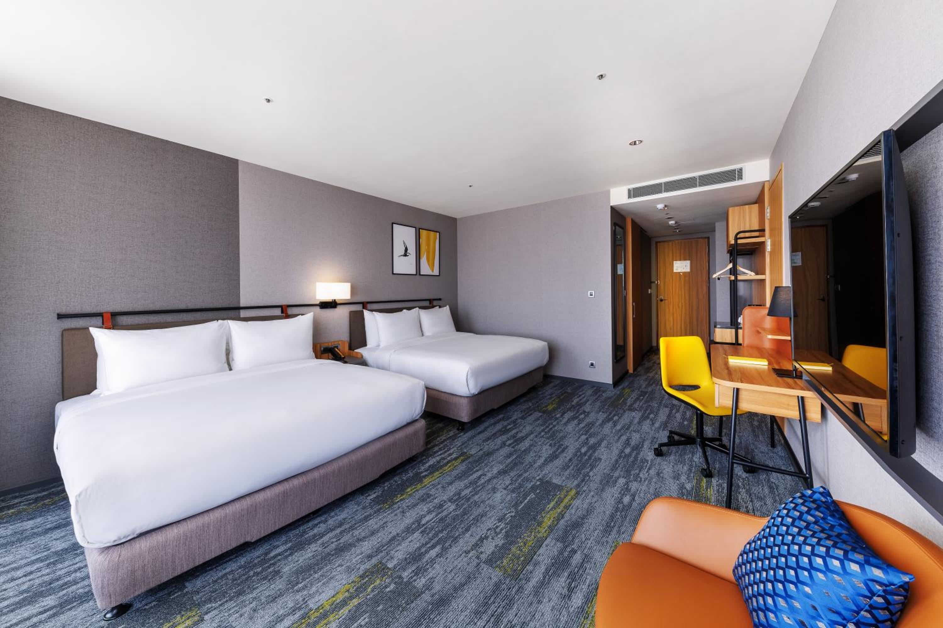 Premium King Room with Two King Beds and Bathtub - Photo 1