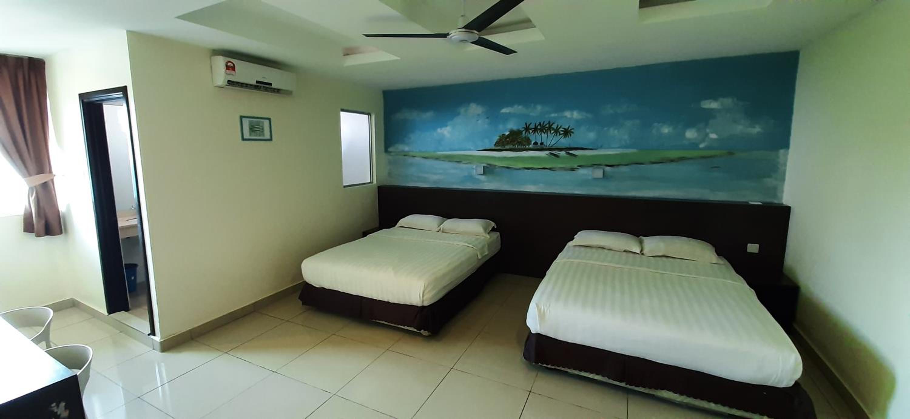 Three-Bedroom Apartment - Photo 24