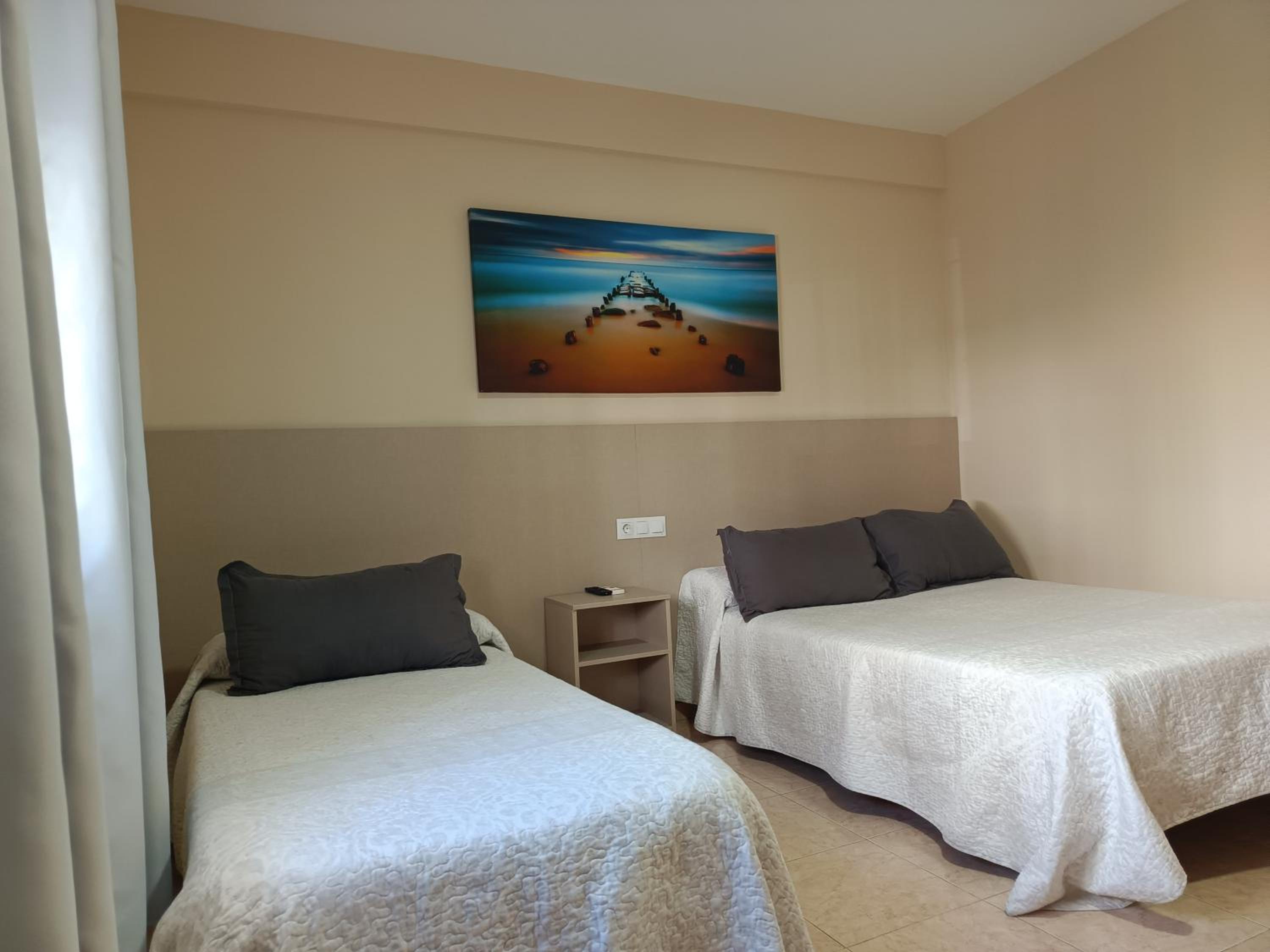 Habitación Triple con Baño Privado