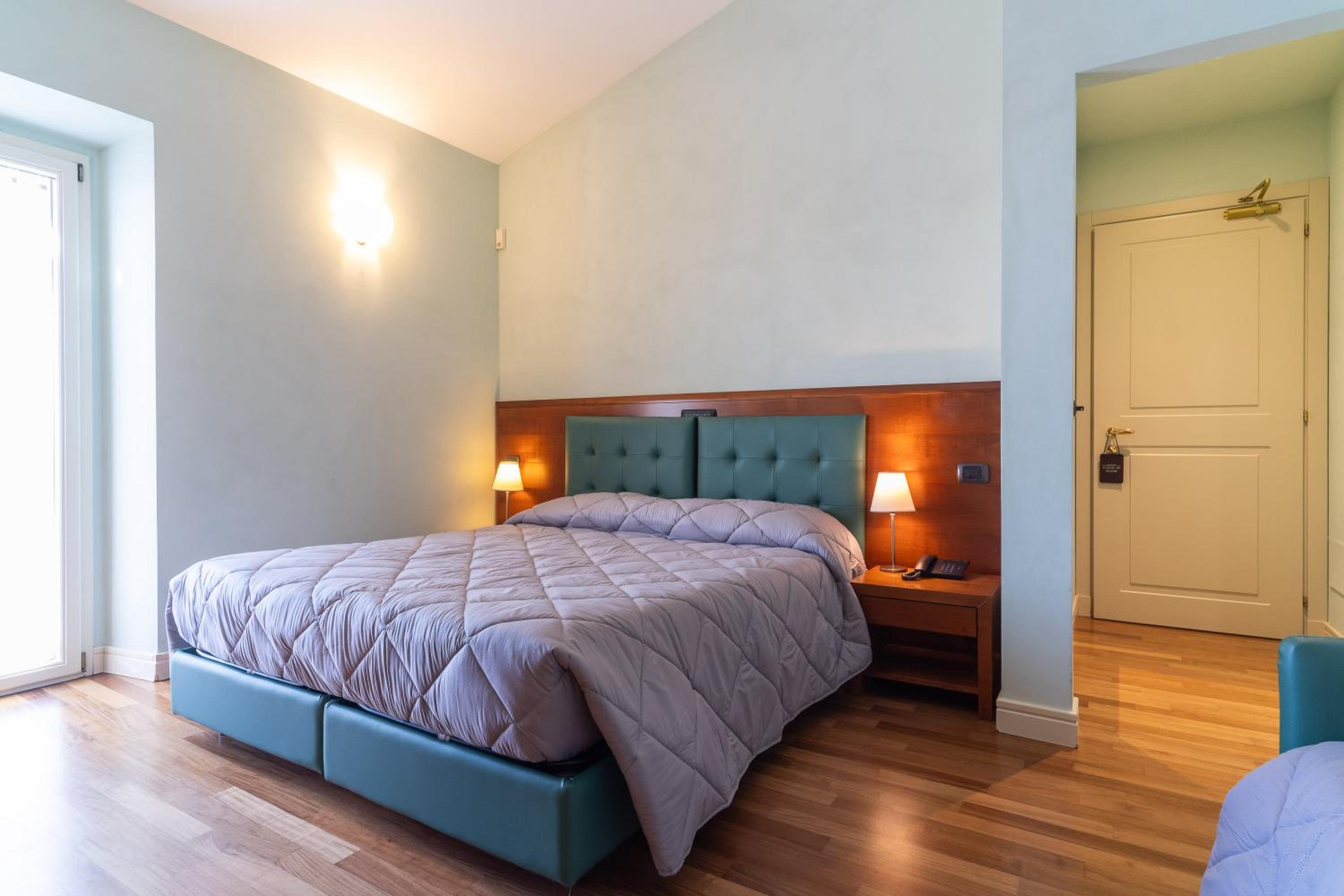 Deluxe Triple Room - Photo 1