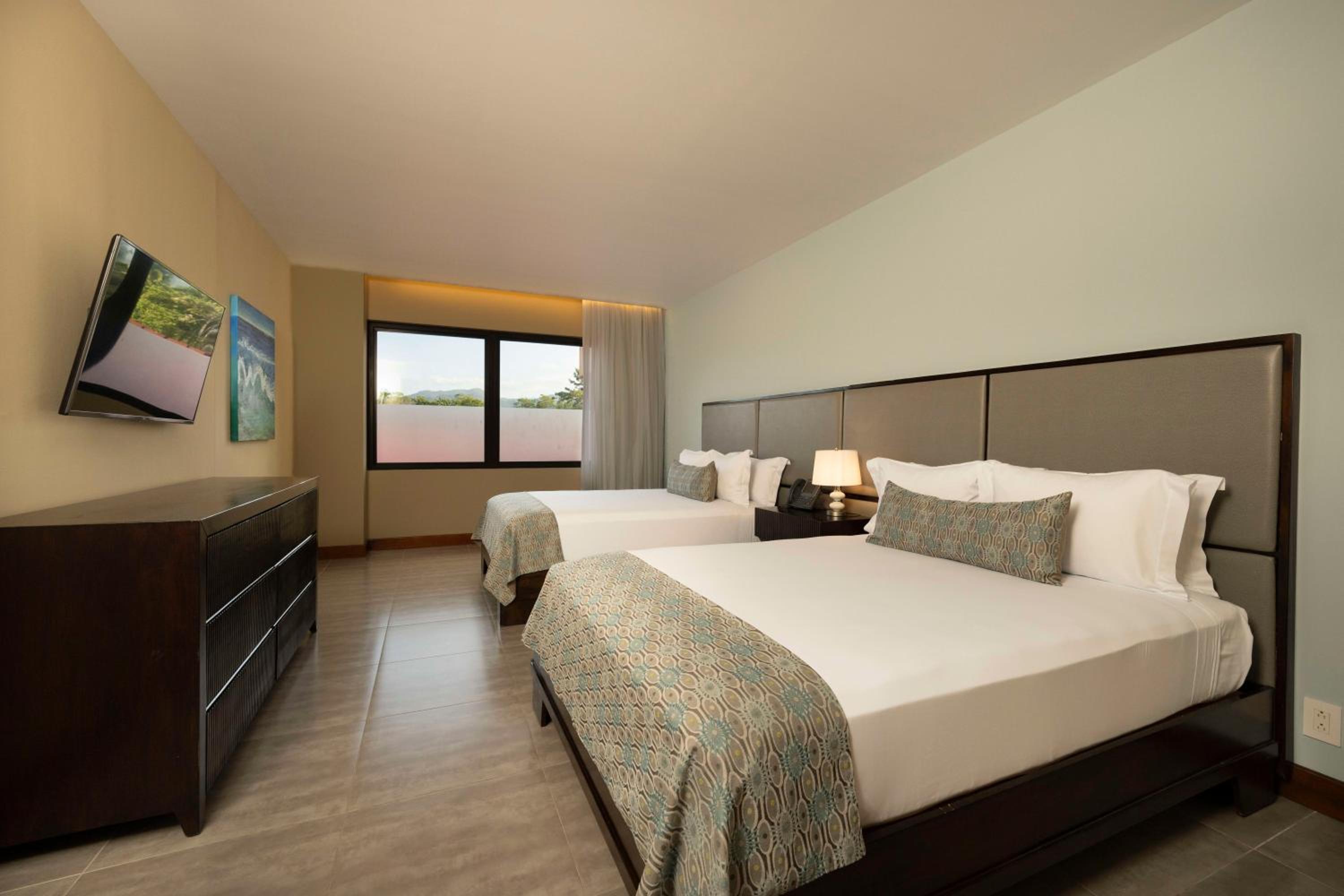 Chambre Lit Queen-Size Deluxe