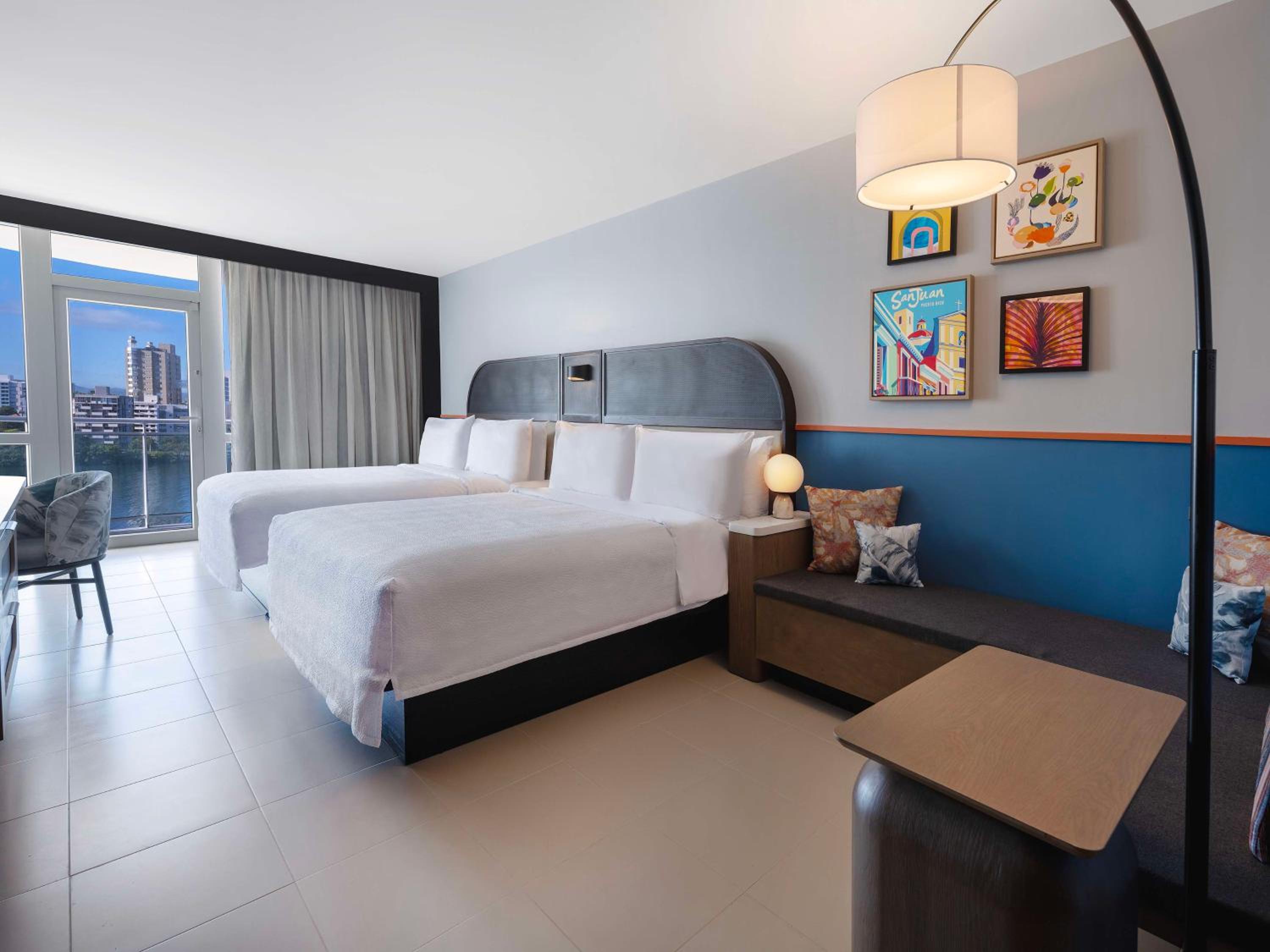 Deluxe Queen Room with Two Queen Beds and Balcony - Bay View - Photo 1