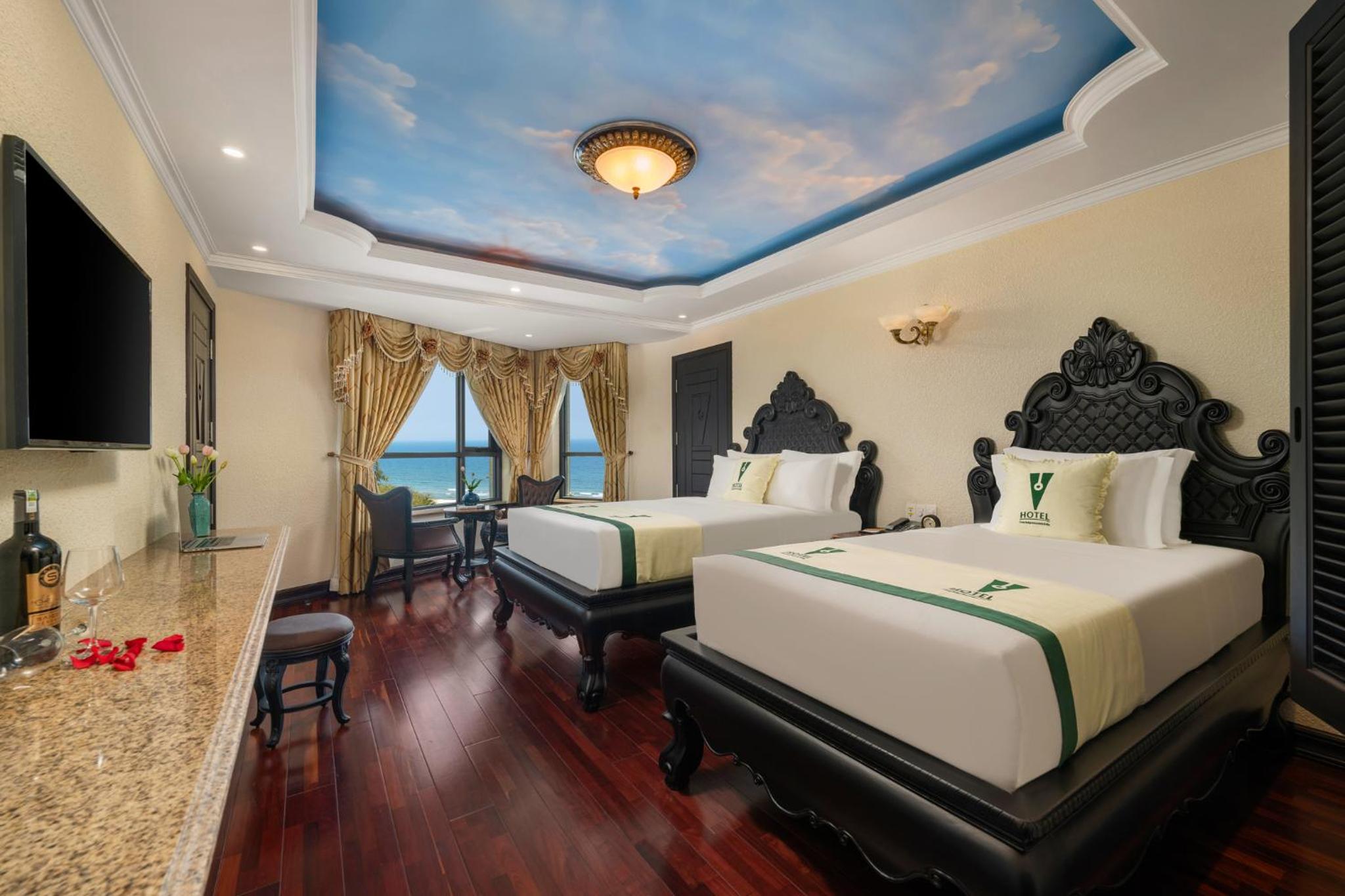 Sunrise Twin Room with Ocean View - Photo 1