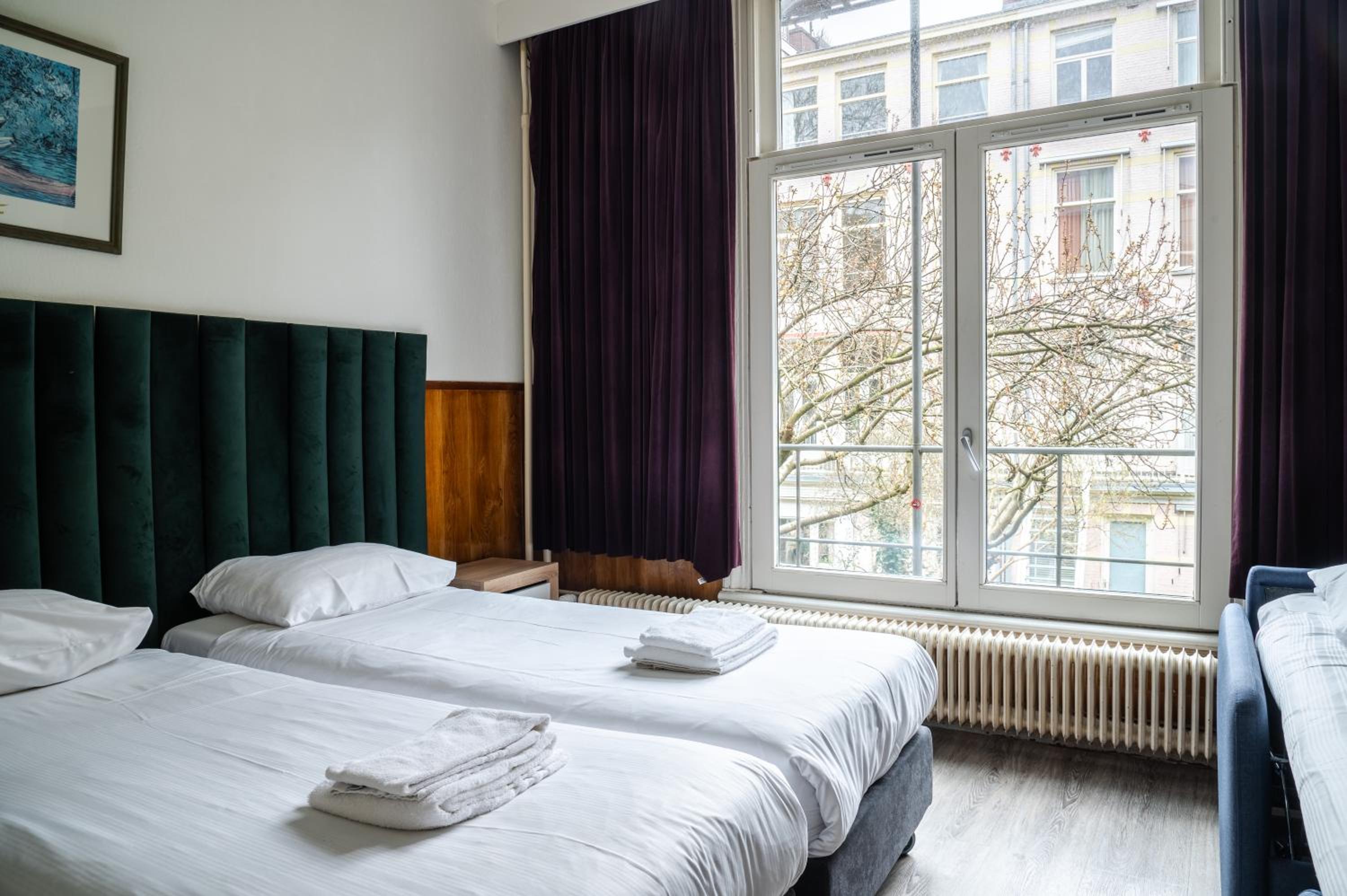Standard Triple Room with Private Bathroom