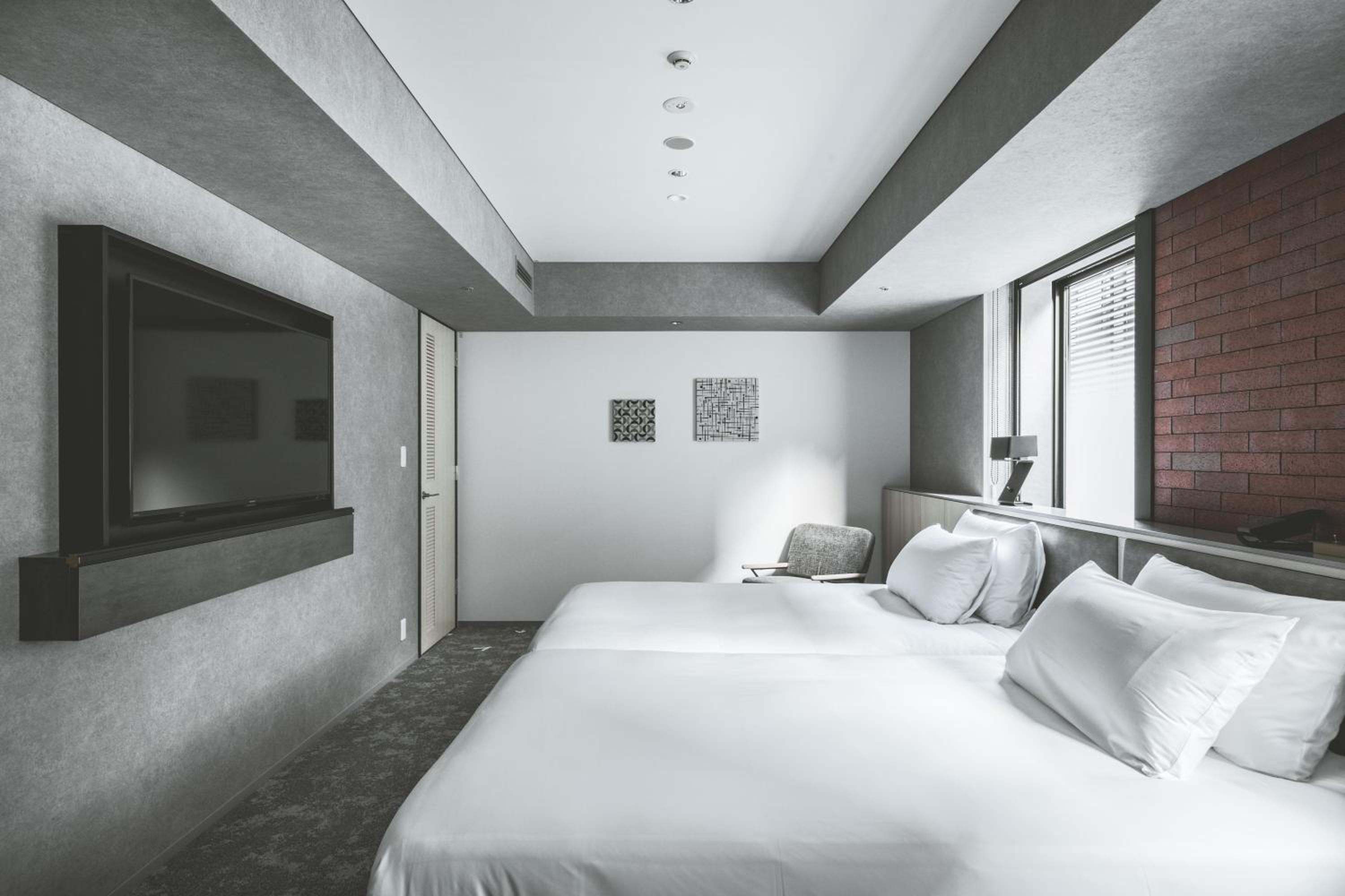 Deluxe Family Twin Room - Photo 19