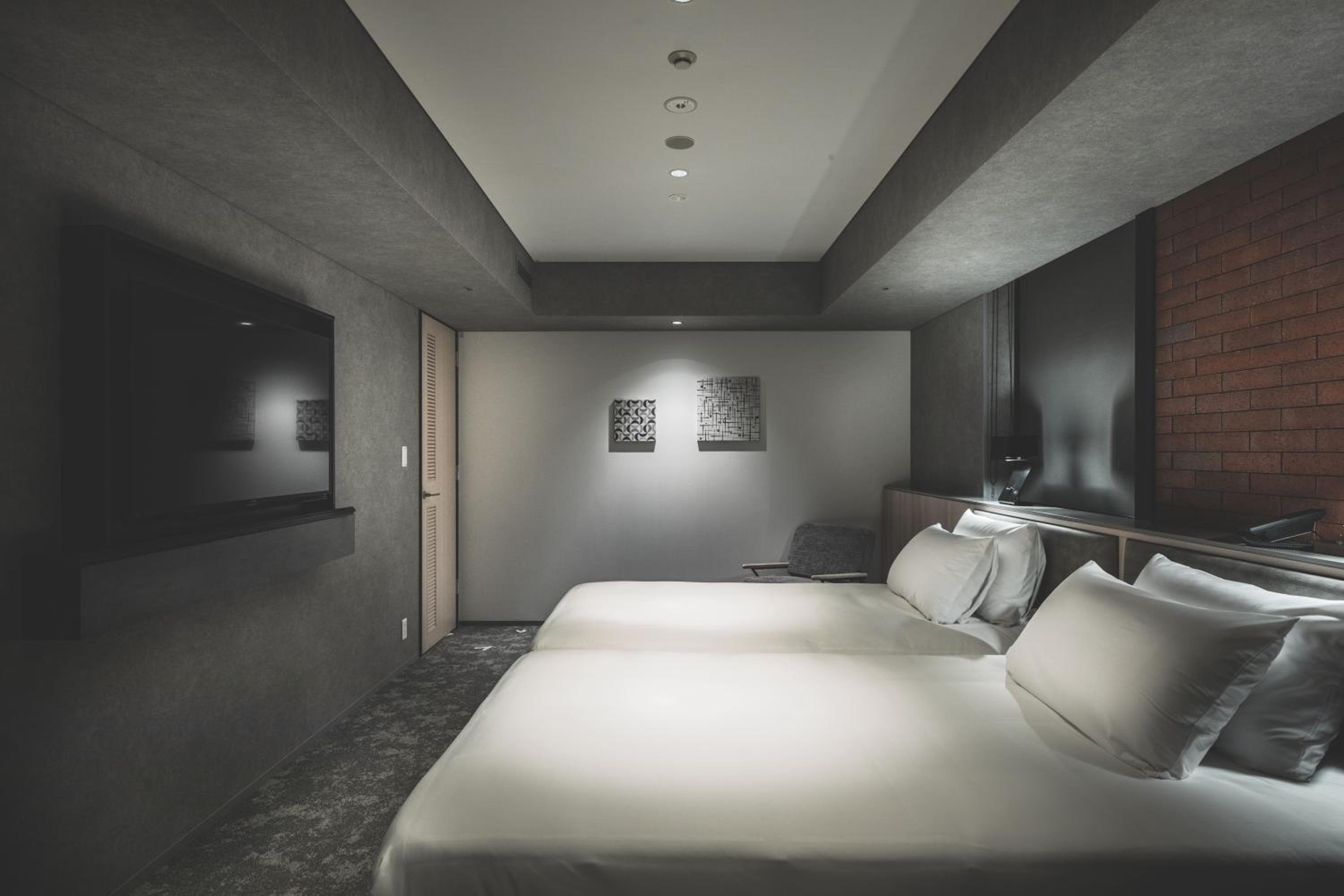Deluxe Family Twin Room - Photo 17