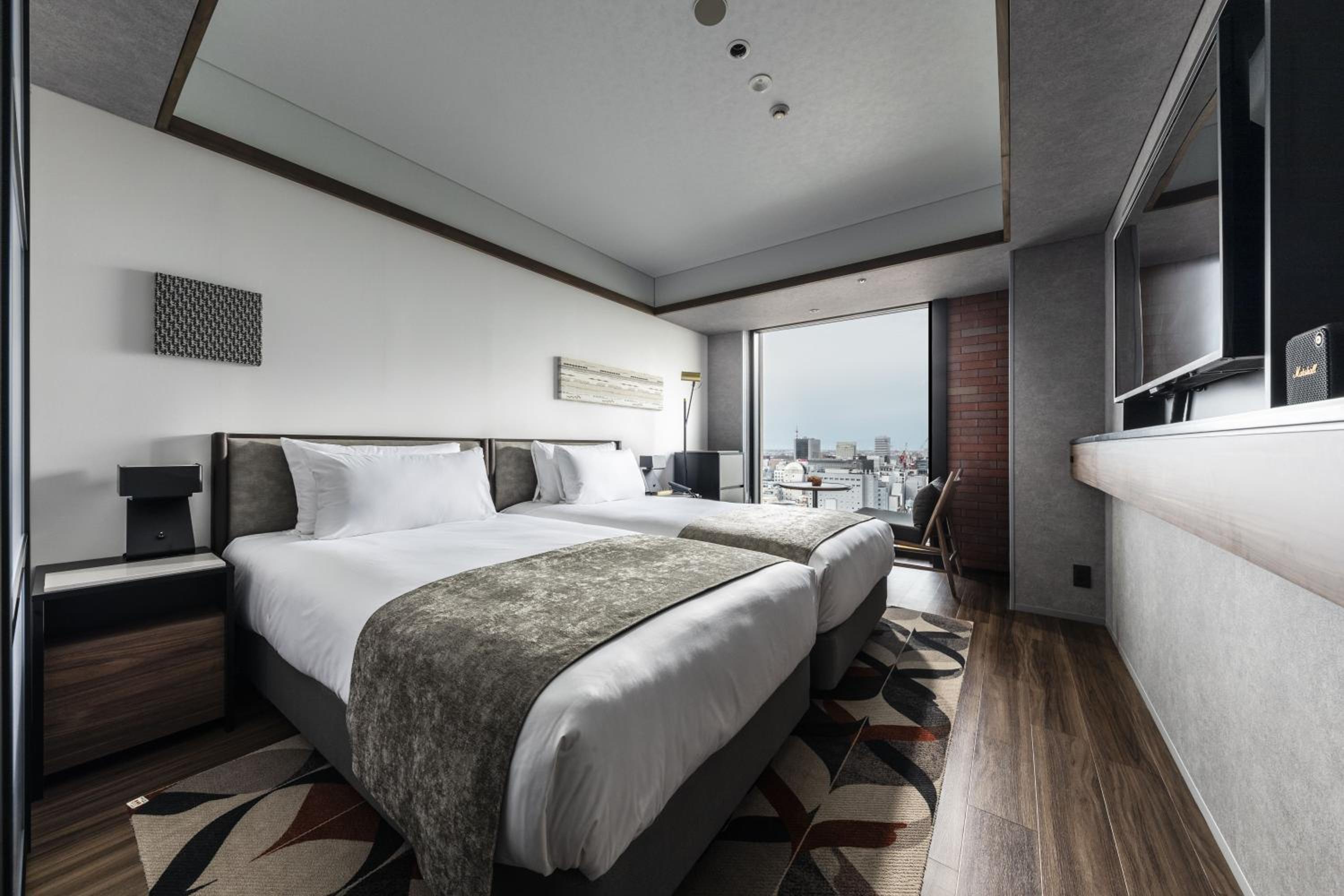 Premium Twin Room - Photo 1