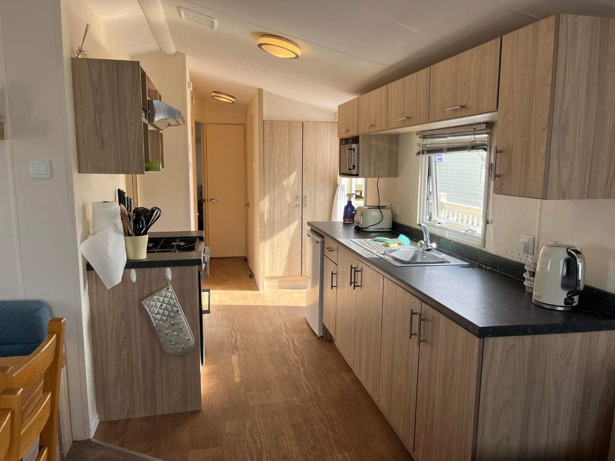 Three-Bedroom House - Photo 12