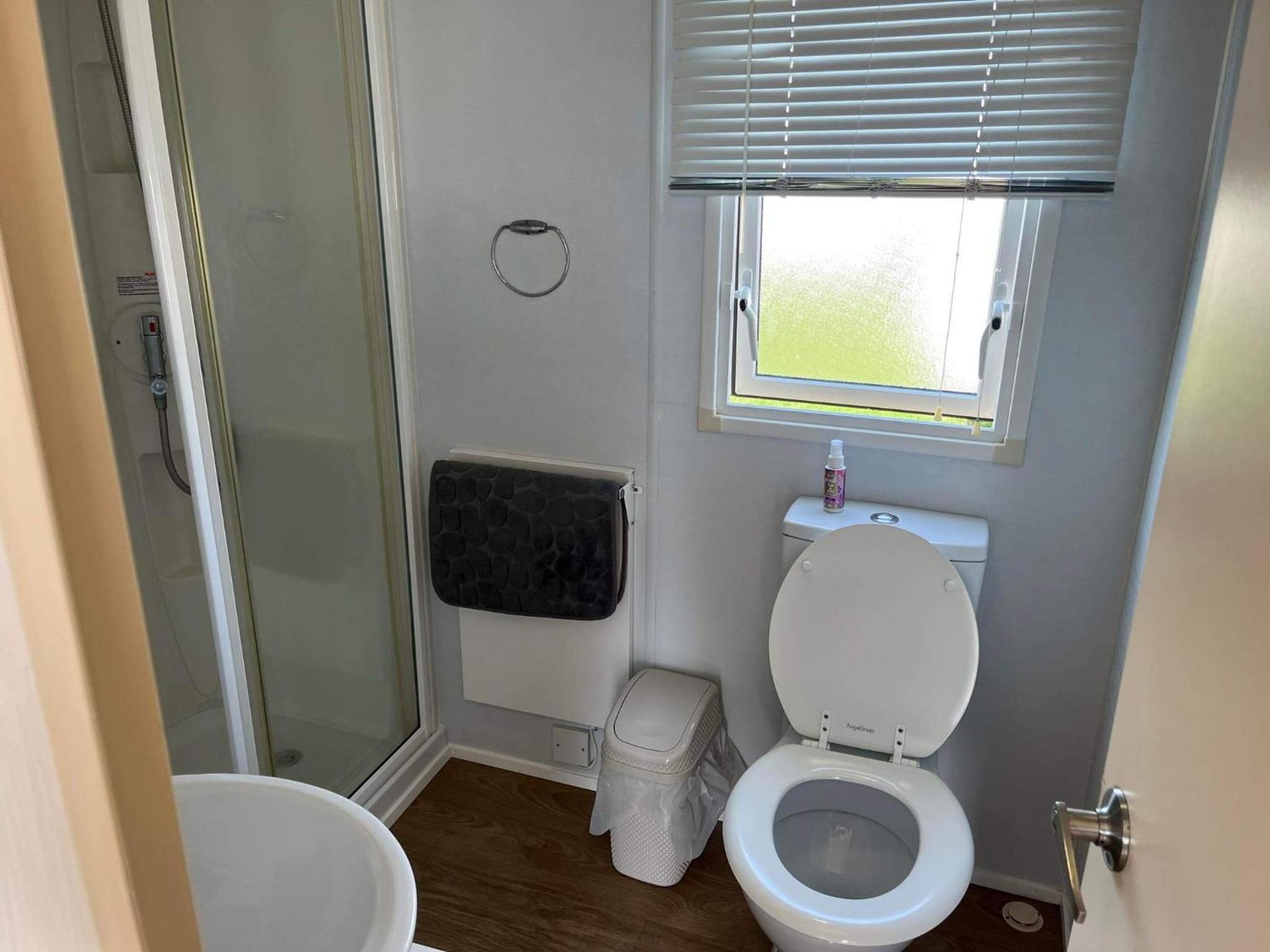 Three-Bedroom House - Photo 14