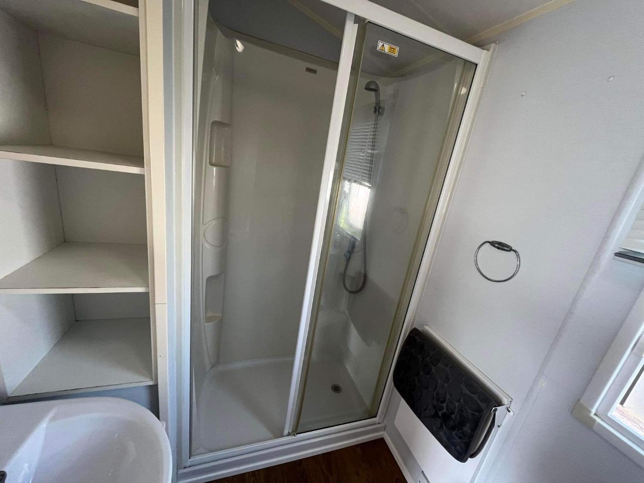 Three-Bedroom House - Photo 15