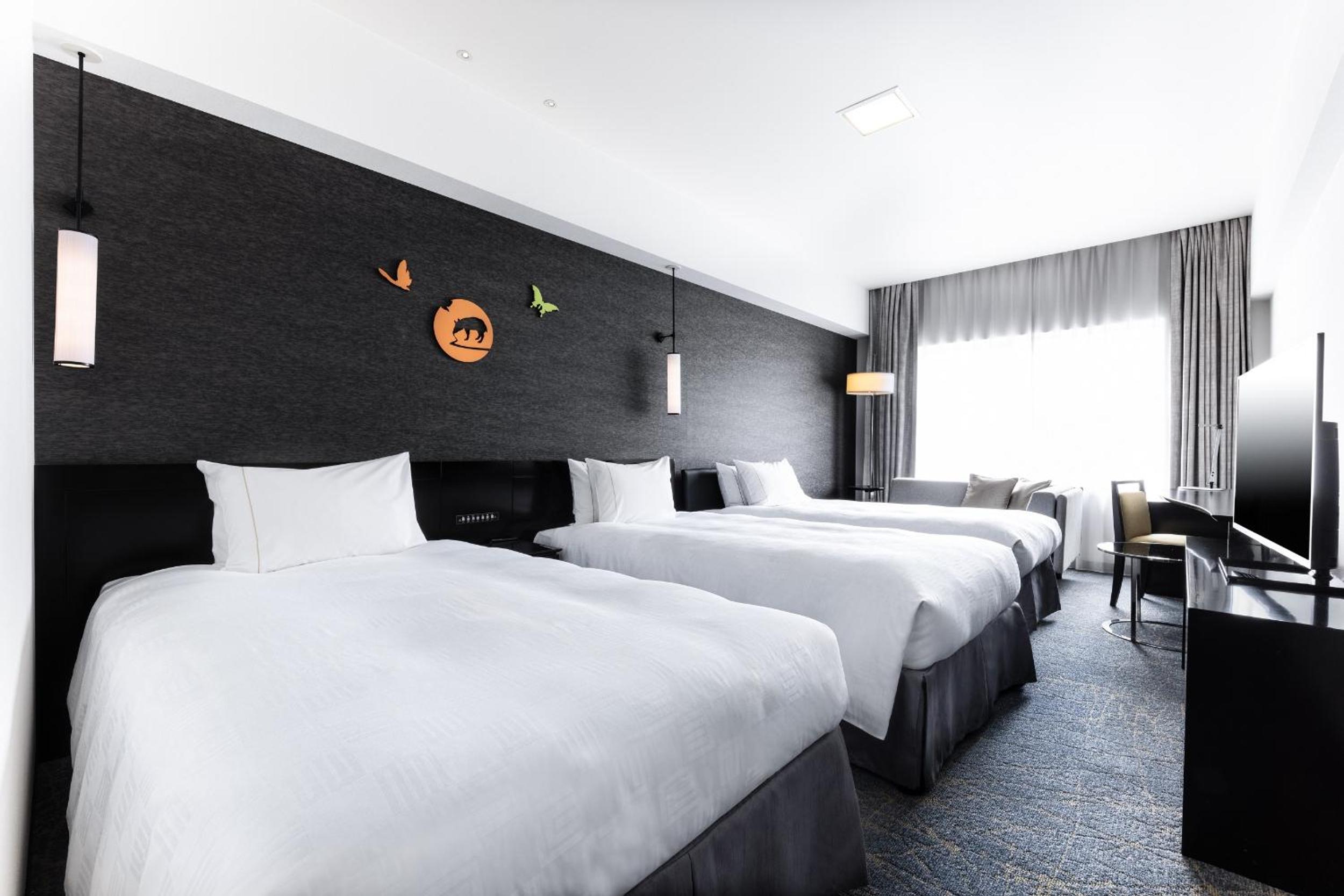 Corner Deluxe Twin Room( 2 Single beds + 1 extra bed) - Photo 1