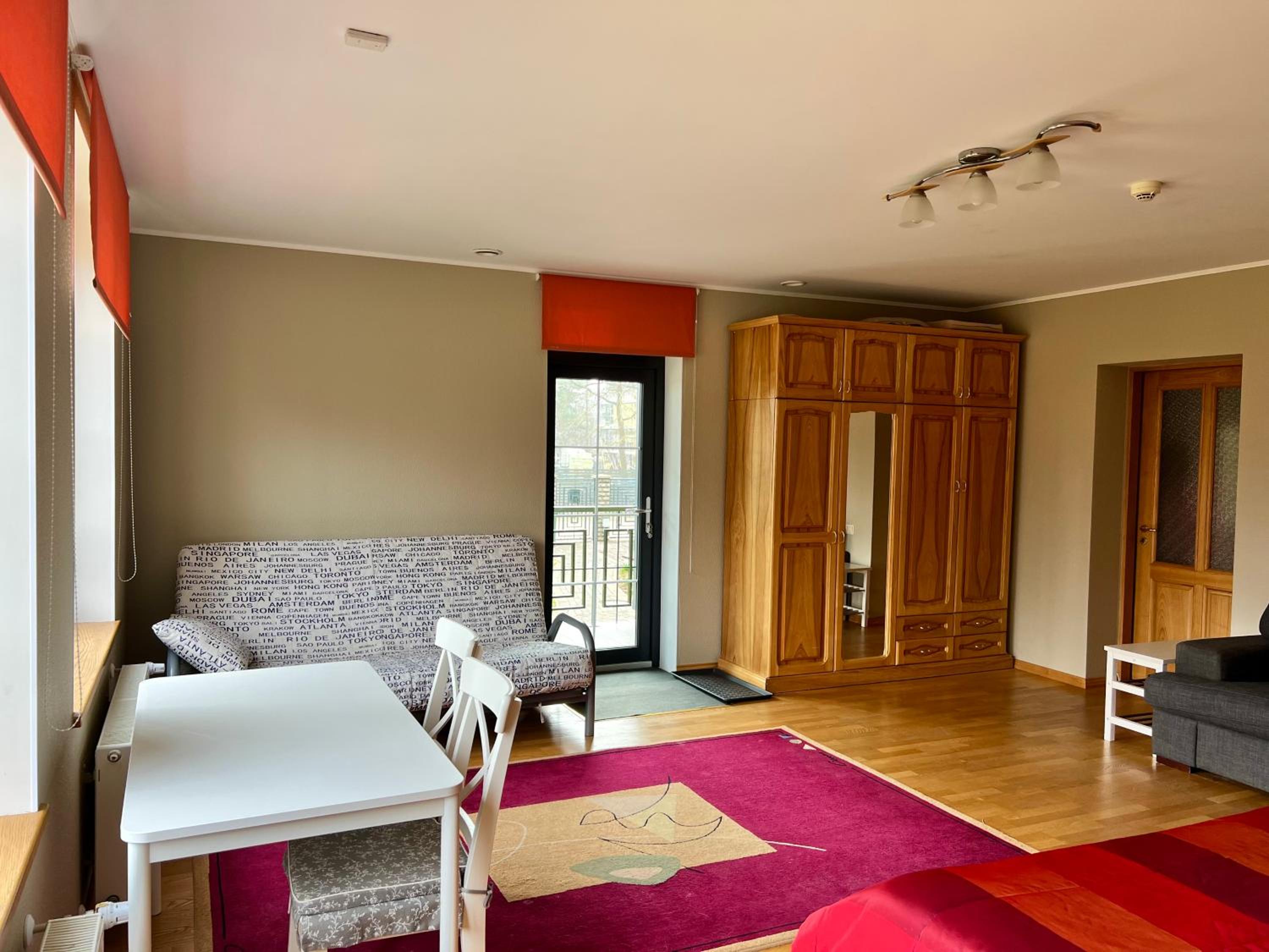 Apartment with Balcony - Photo 6