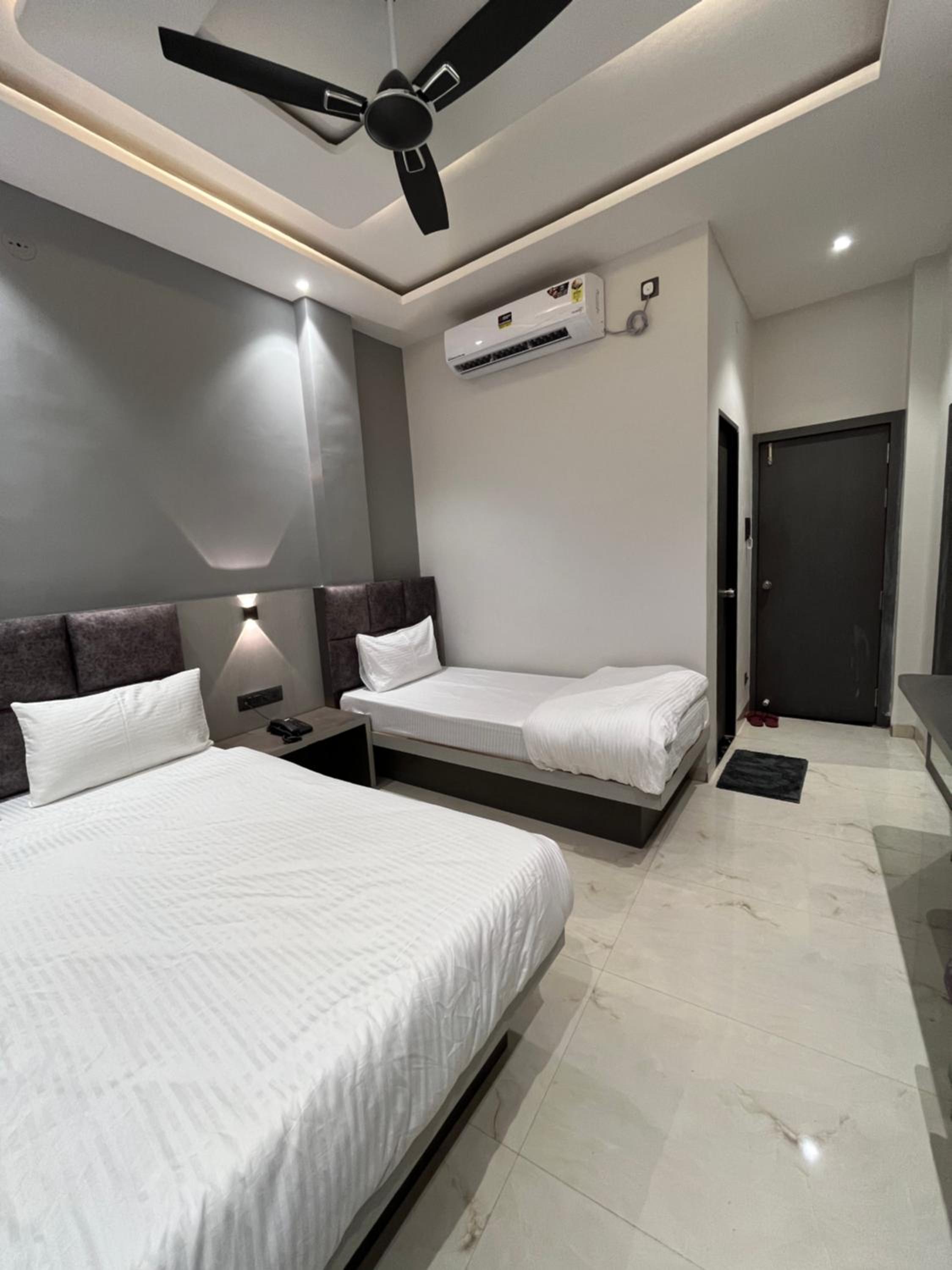 Deluxe Triple Room - Photo 5