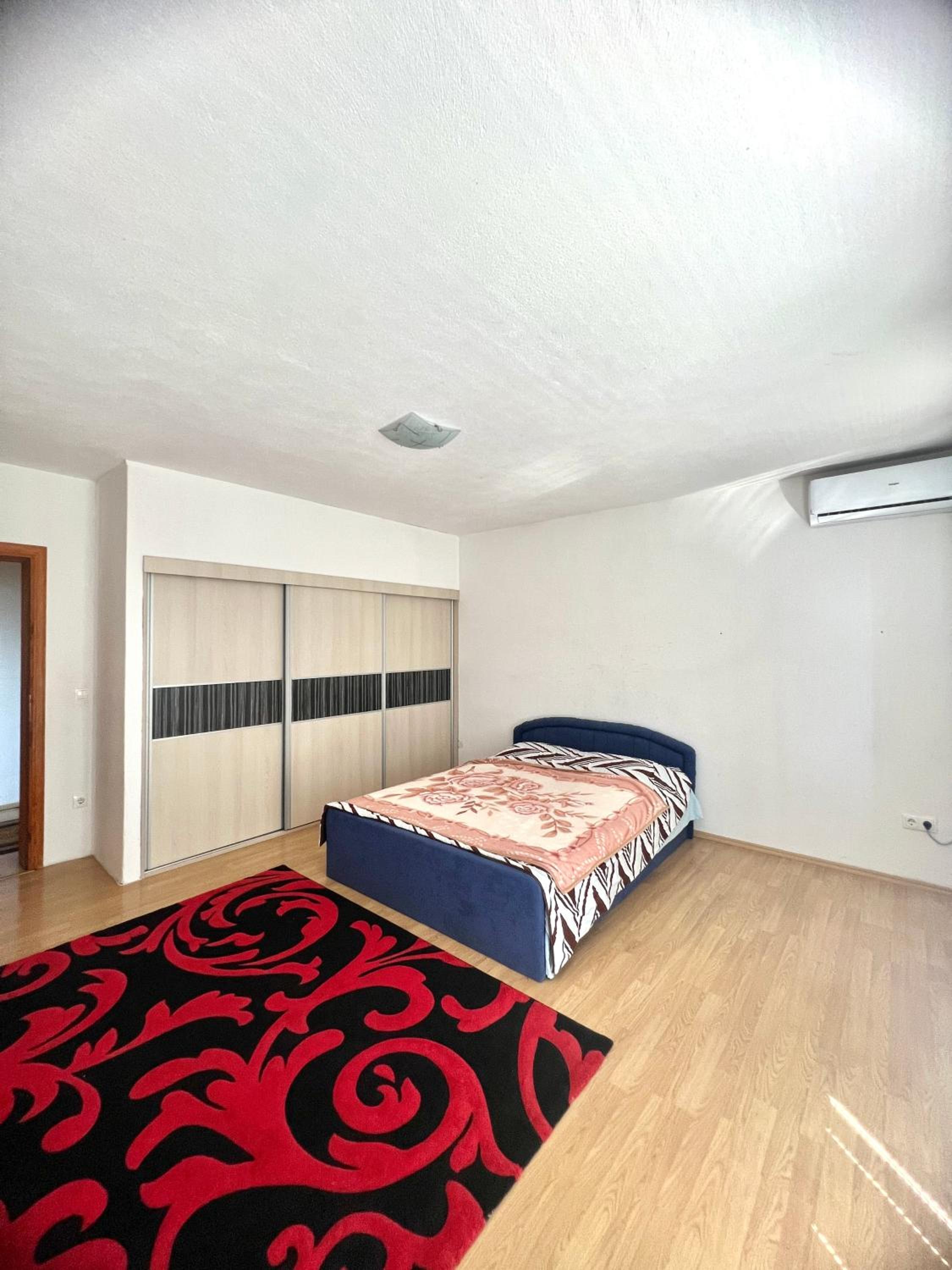 Three-Bedroom Apartment photo 1