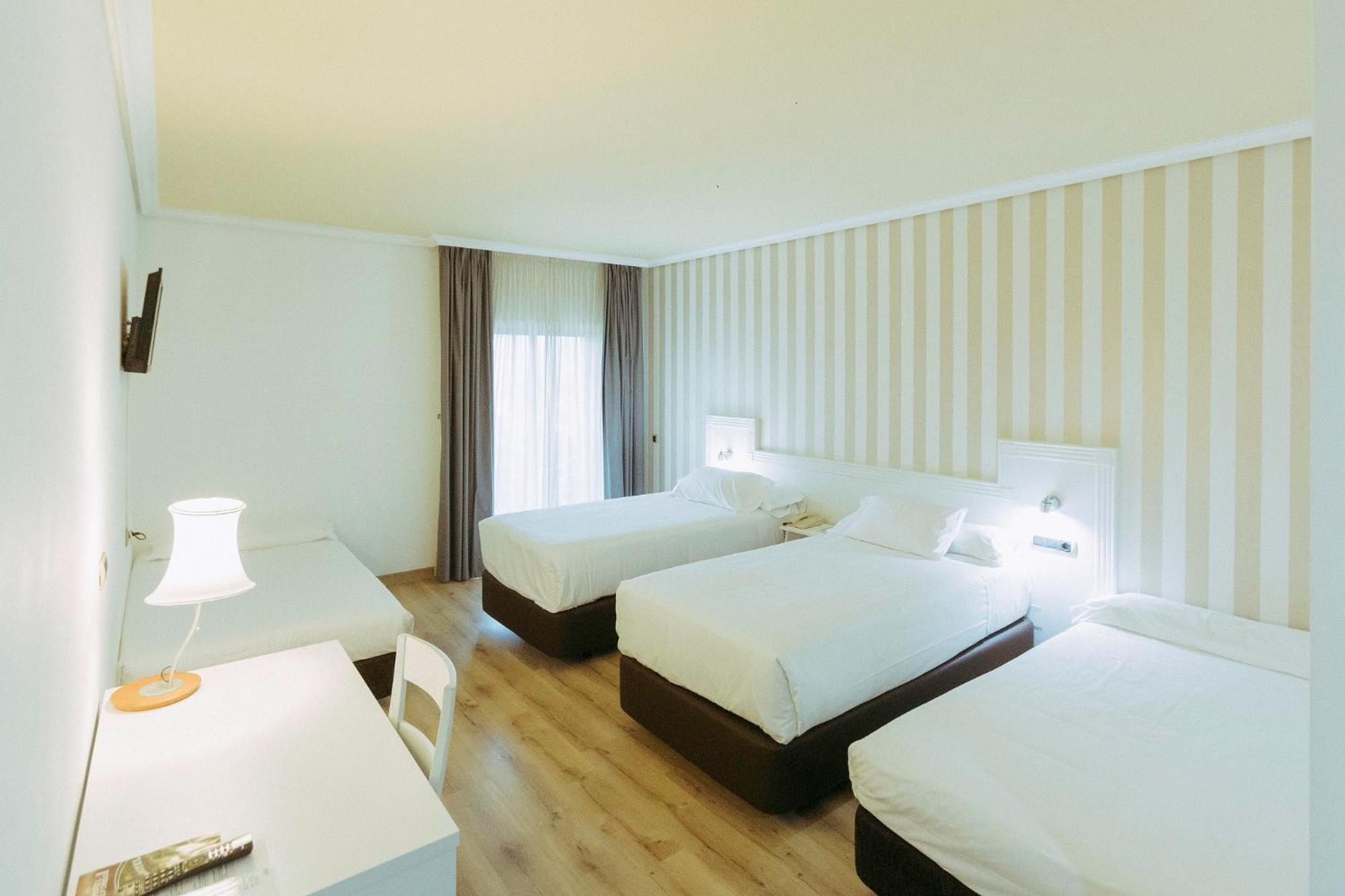 Habitación Familiar (4 Adultos) Habitación Familiar (4 Adultos)