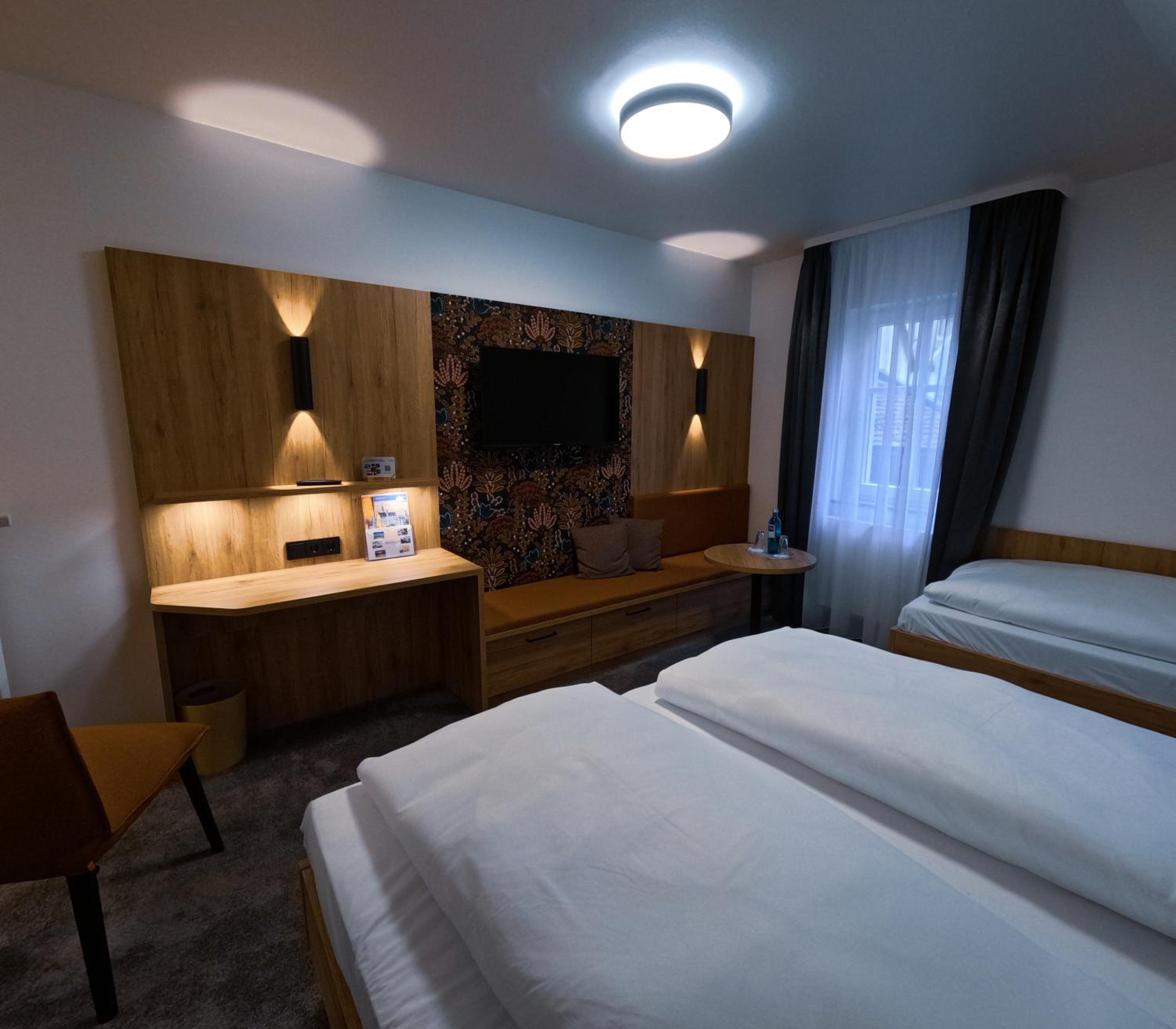 Deluxe Triple Room - Photo 7