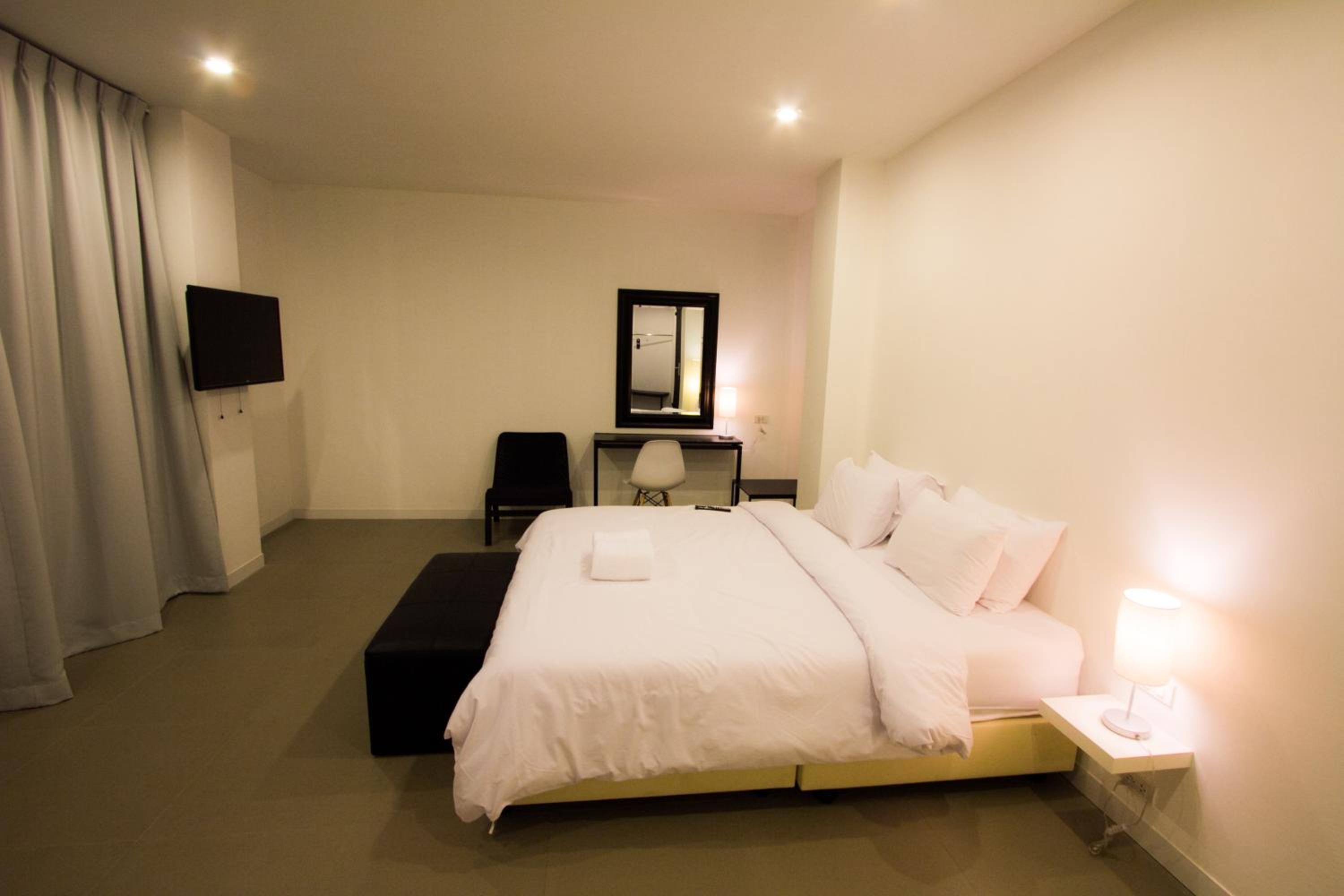 Triple Room with 1 Double Bed and 1 Single Bed - Photo 1