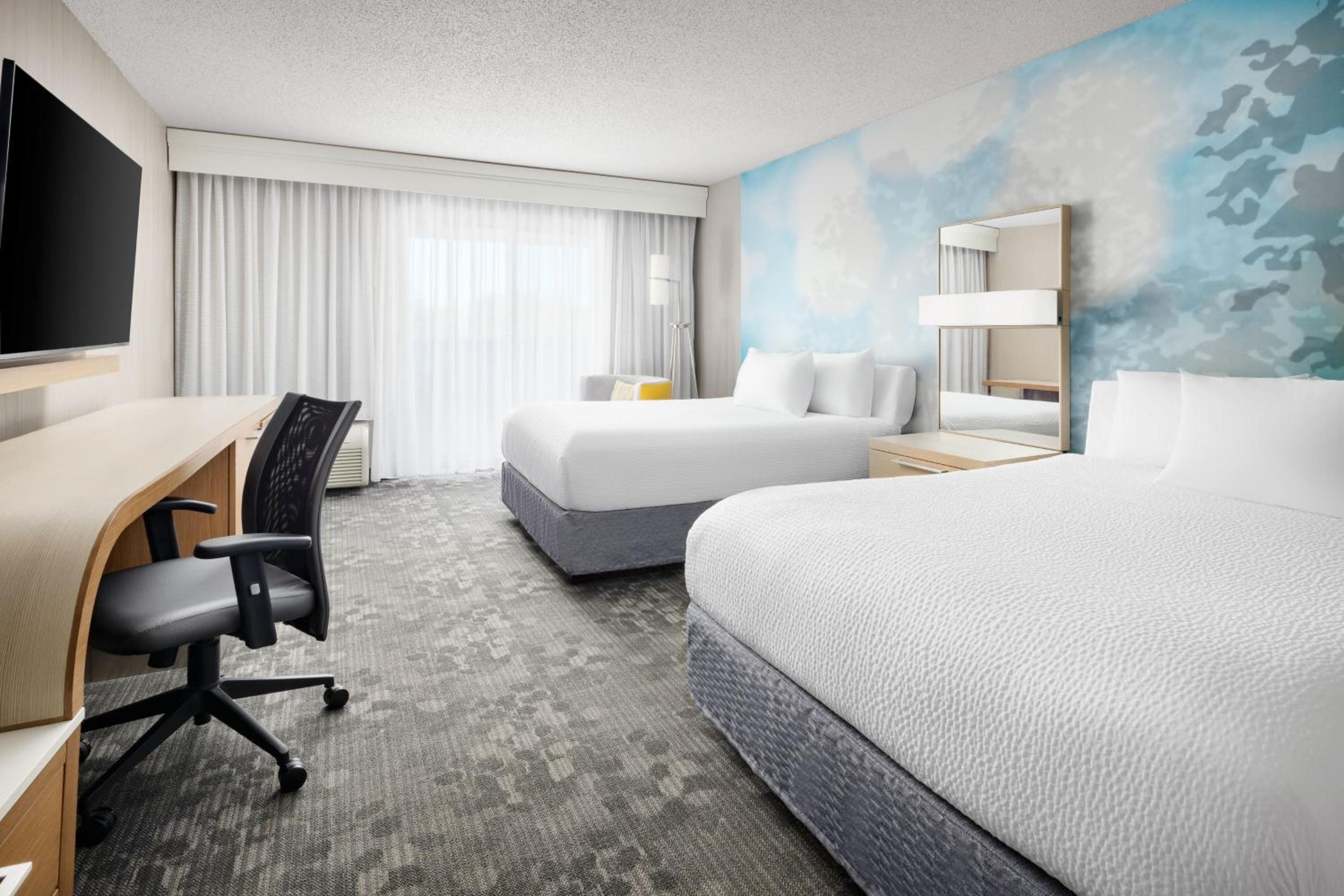Queen Room with Two Queen Beds - Hearing Accessible - Photo 1