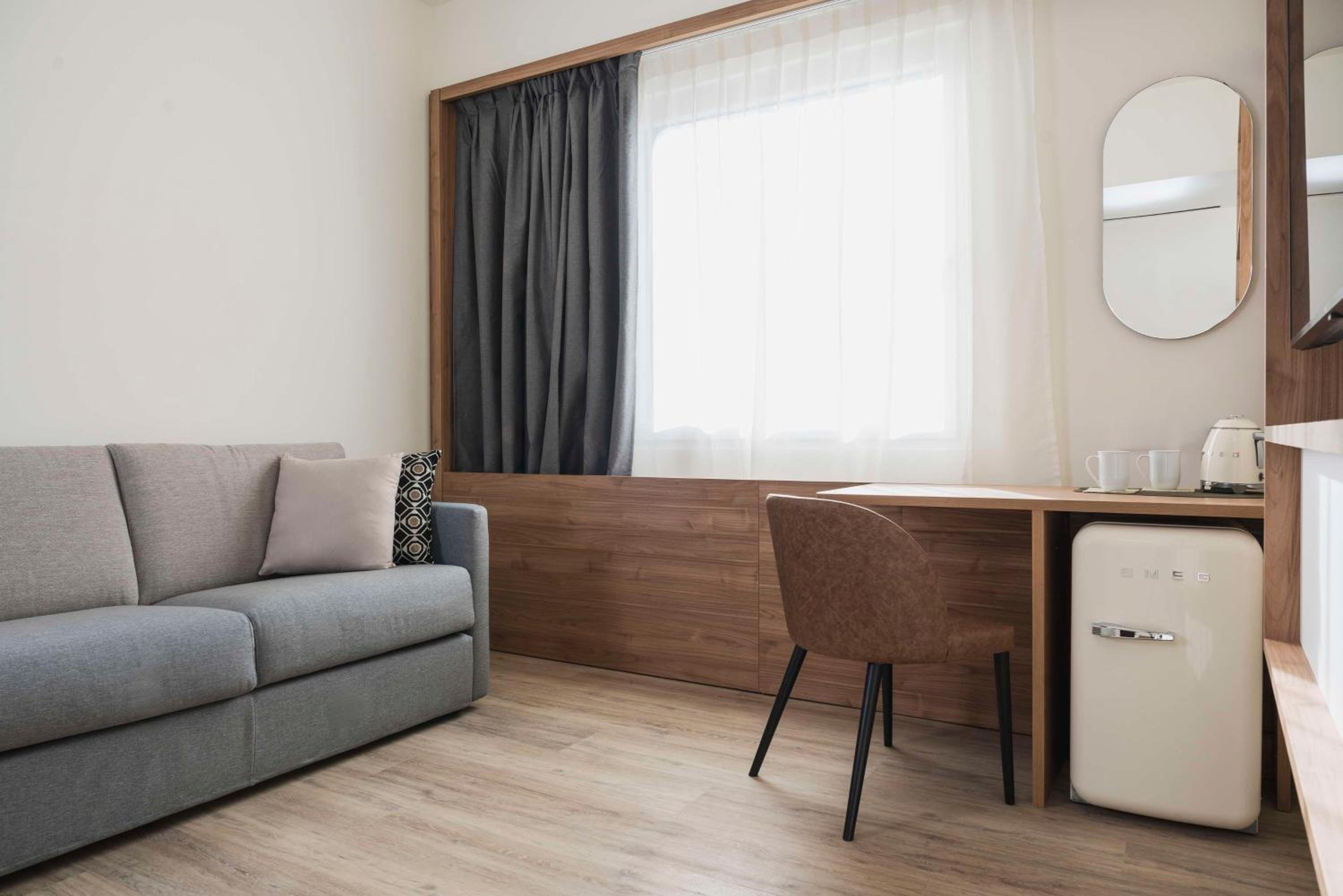 King Room with Sofa Bed - Photo 16