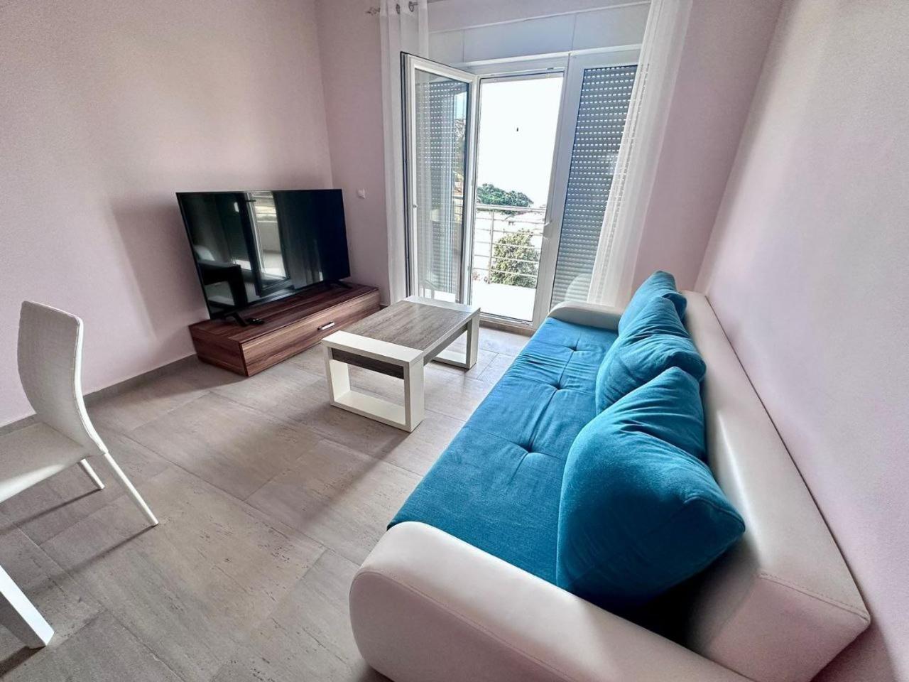 One-Bedroom Apartment with Balcony and Sea View