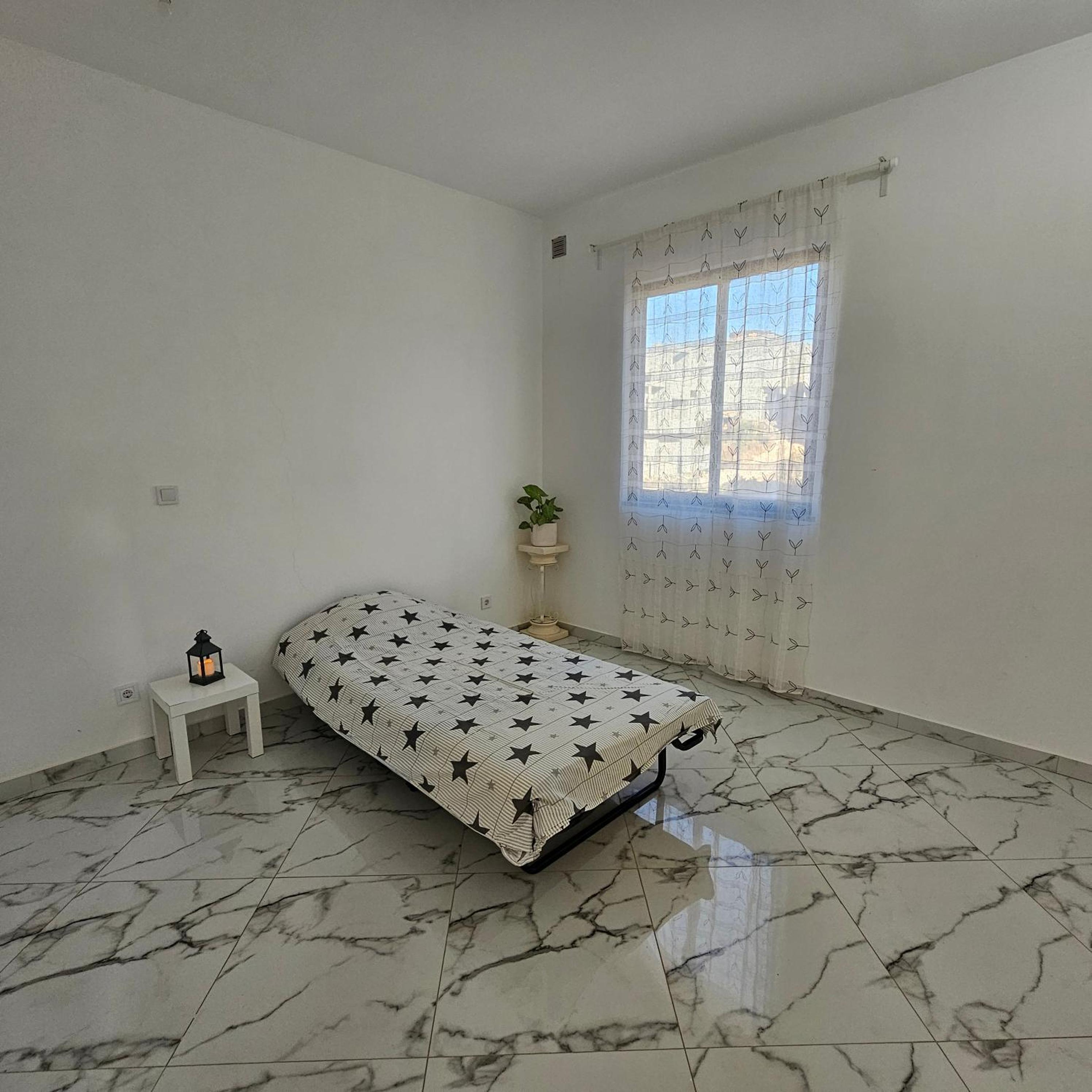 Three-Bedroom Apartment photo 1